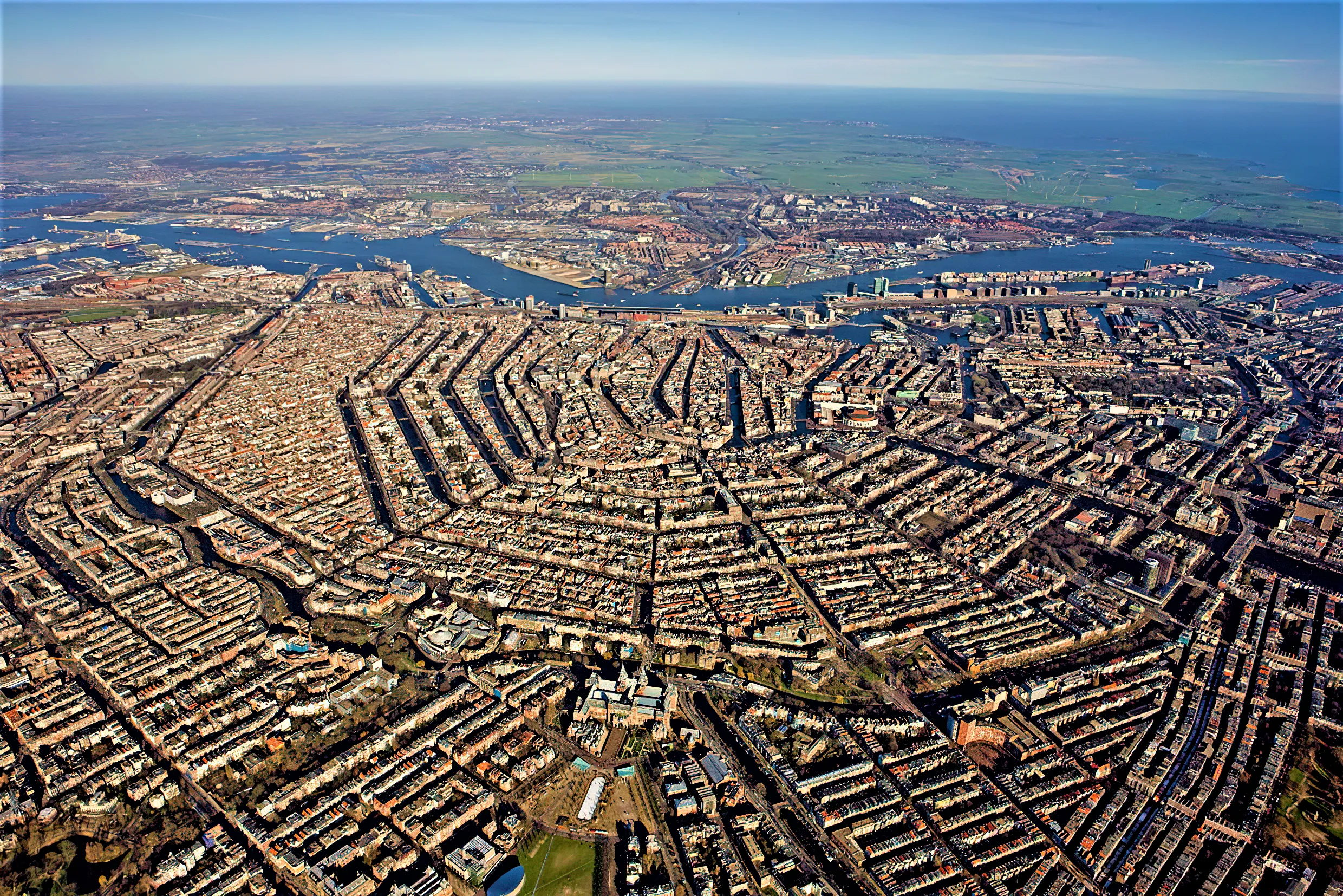 Aerial view of Amsterdam canals and rooftops