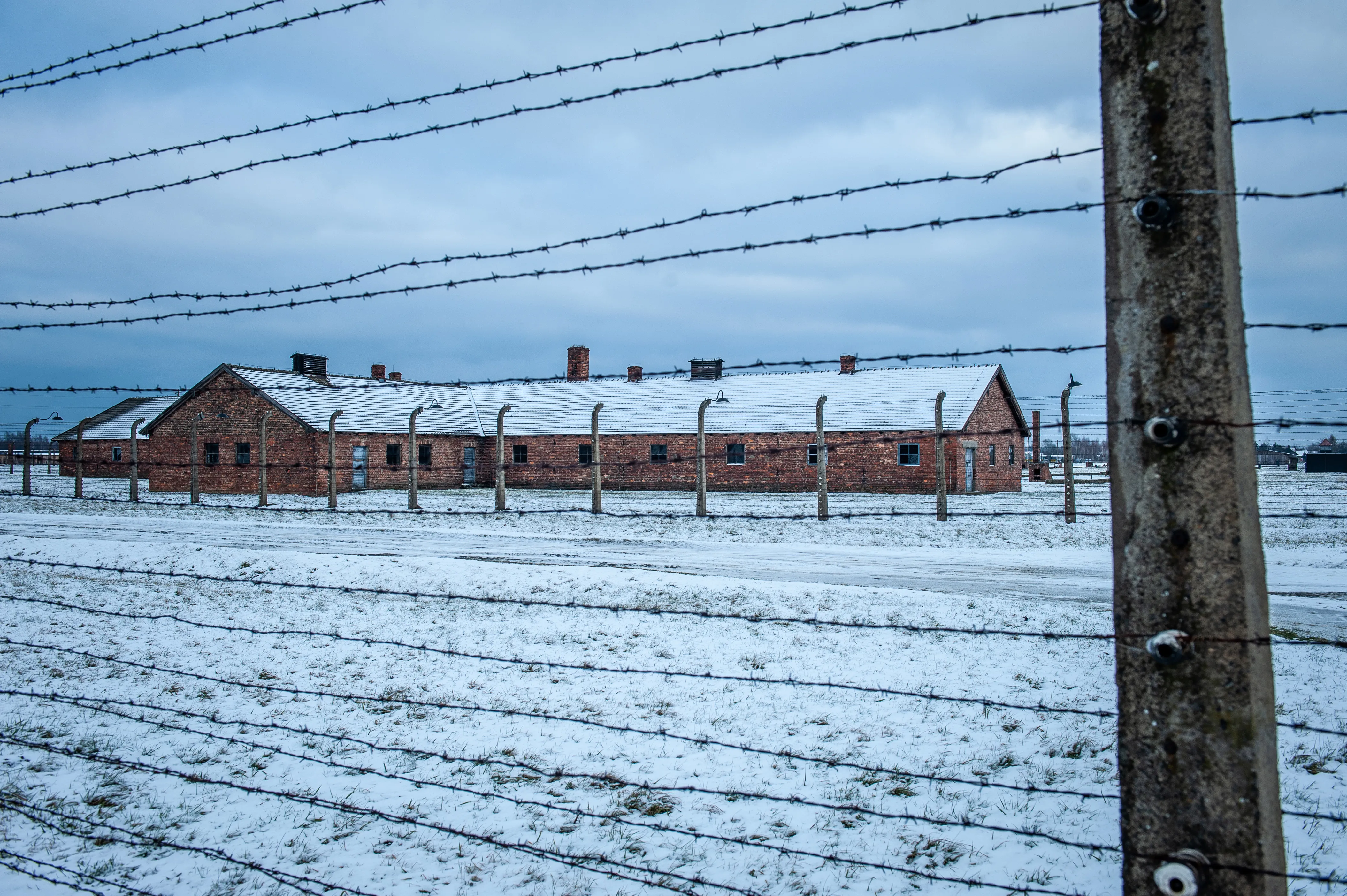 Birkenau fences and barracks in winter