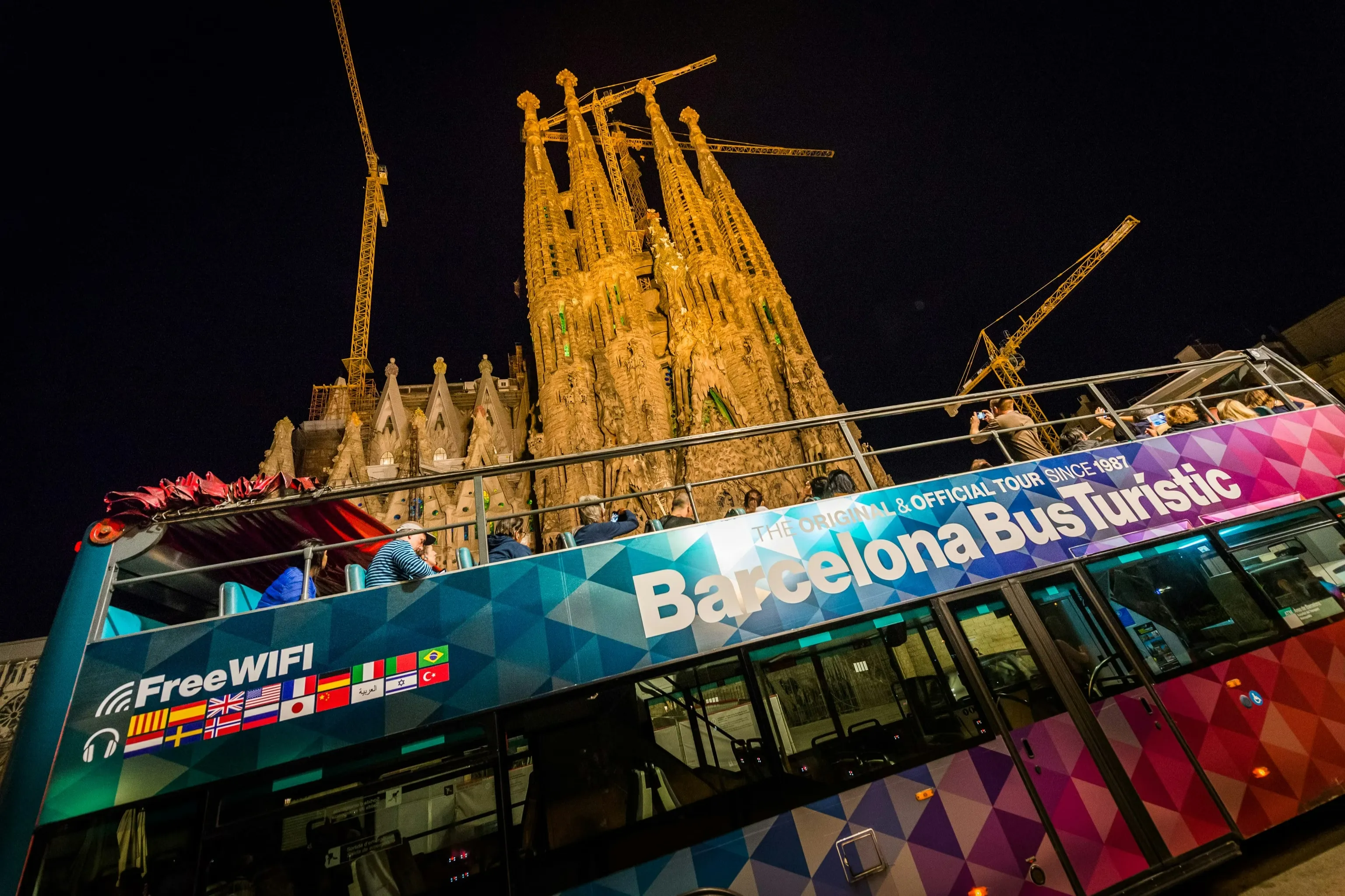 Night bus passing Sagrada Família