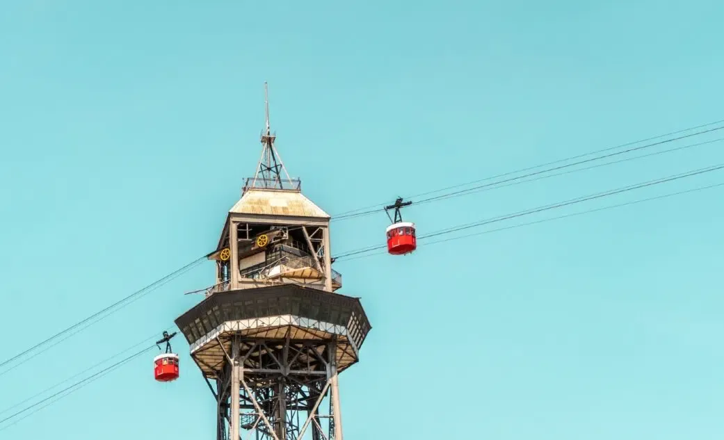 Montjuïc cable car cabins with city views.