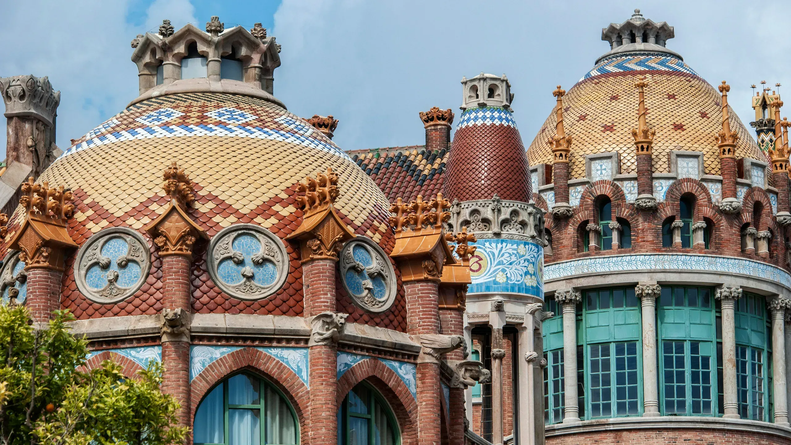 Colorful ceramic roof tile details at Sant Pau