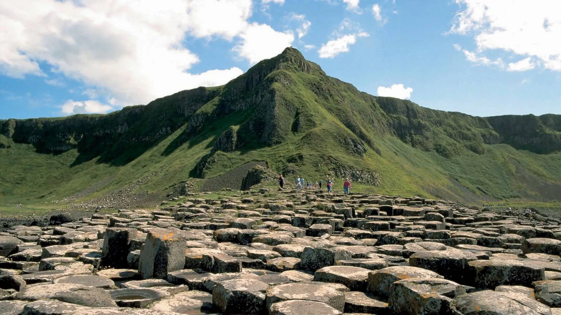 Hexagonal basalt stones stretching toward the sea at Giant's Causeway