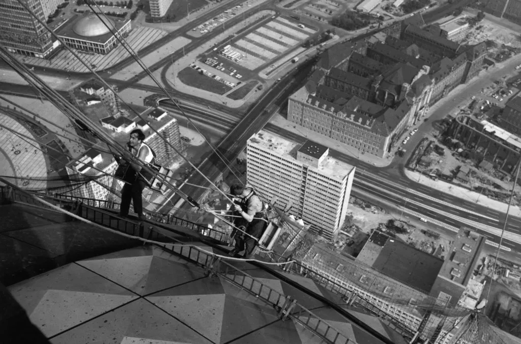 Worker climbing the Berlin TV Tower in 1969