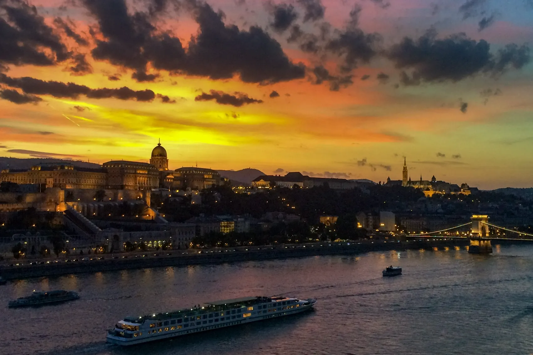 Danube cruise with castle at sunset