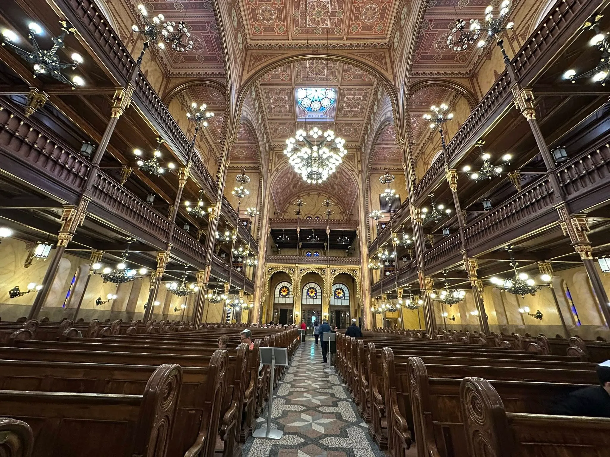 Central aisle and seating in the synagogue interior
