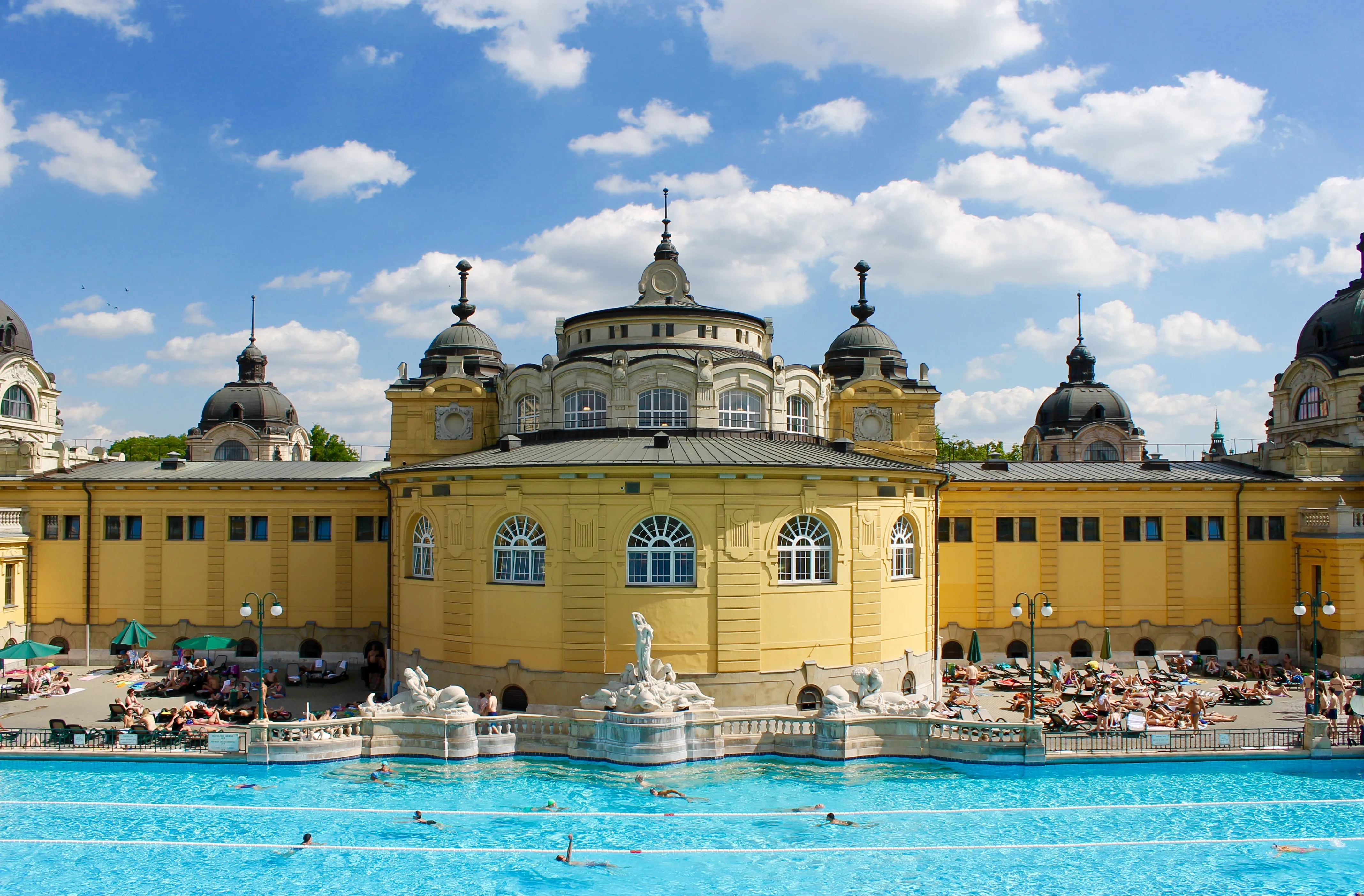 Outdoor thermal pool at Széchenyi Baths with neo-baroque architecture