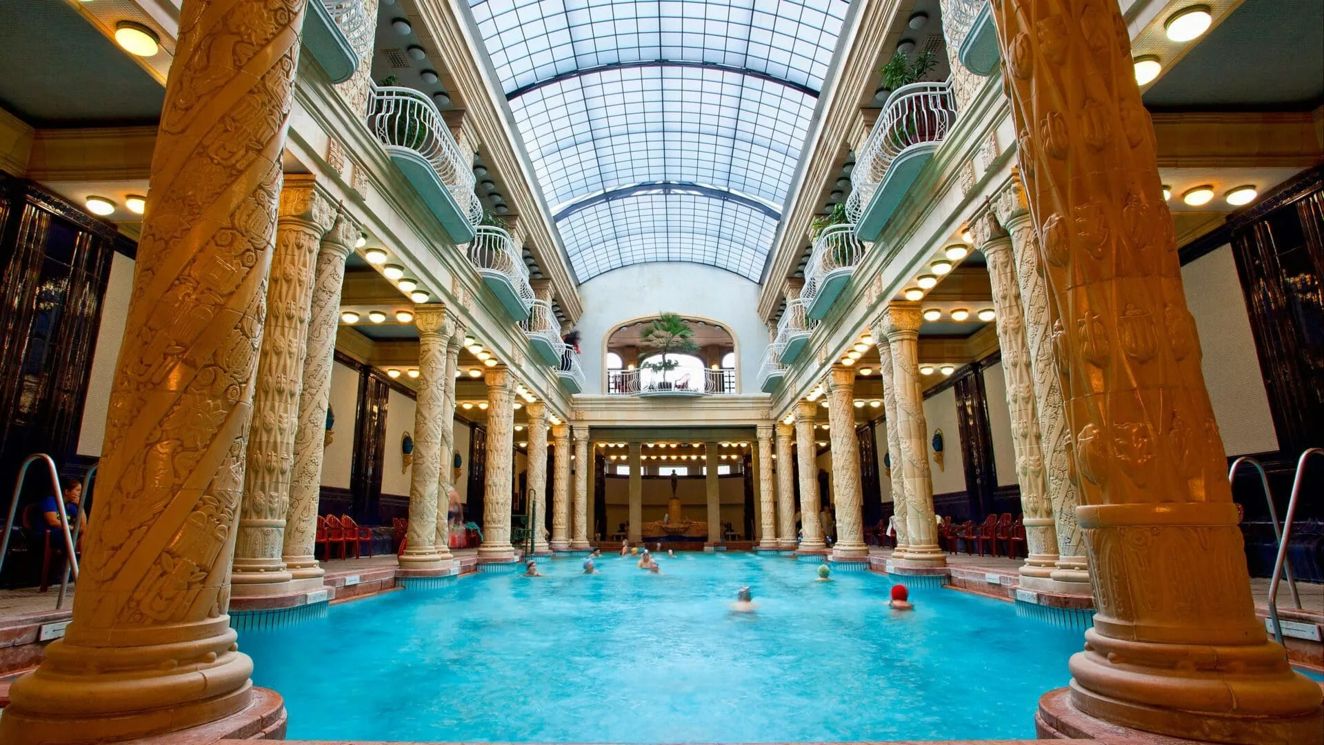 Ornate indoor thermal pool hall at Széchenyi Baths Budapest