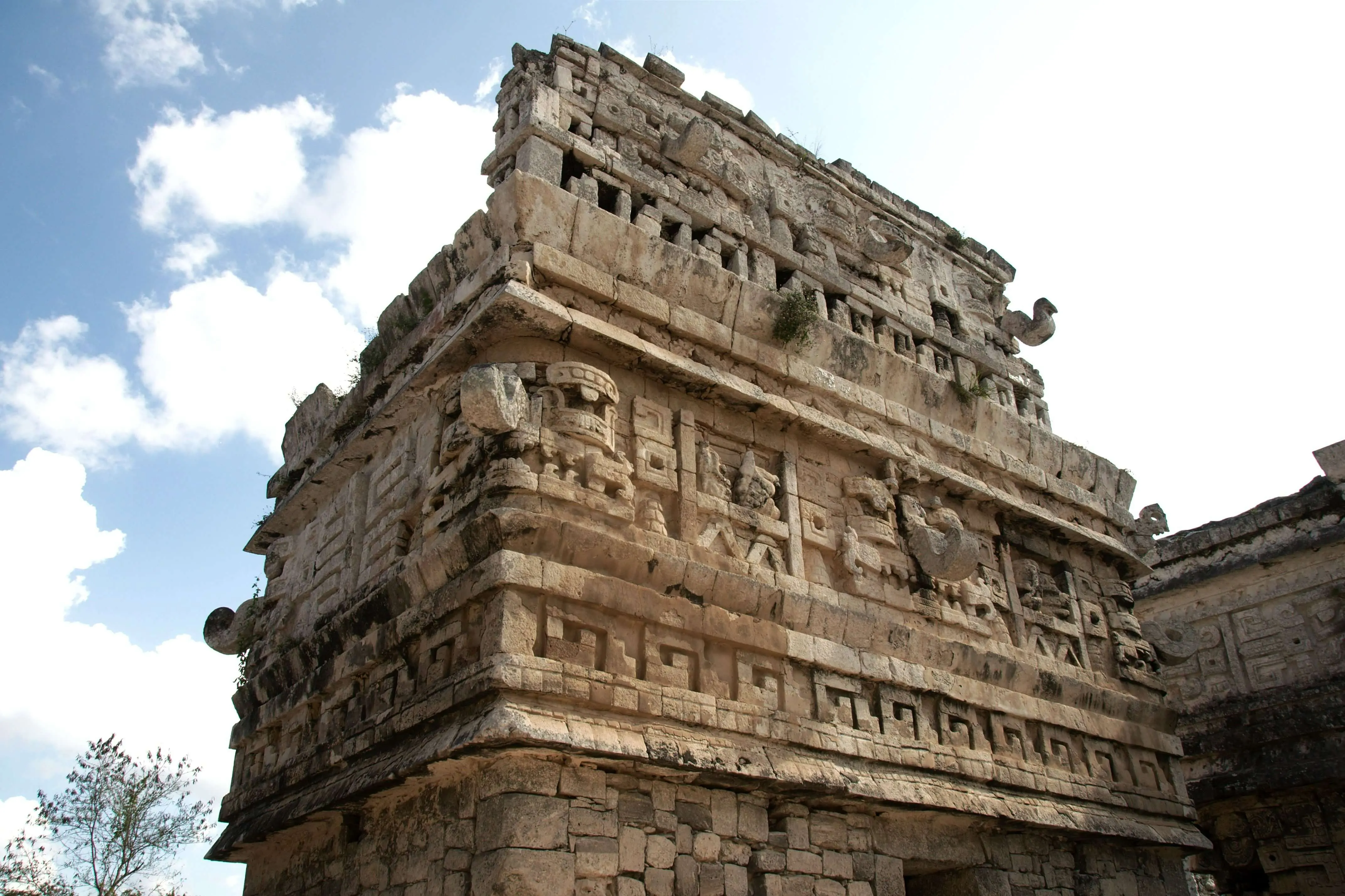 Puuc-style building facade with geometric stone motifs