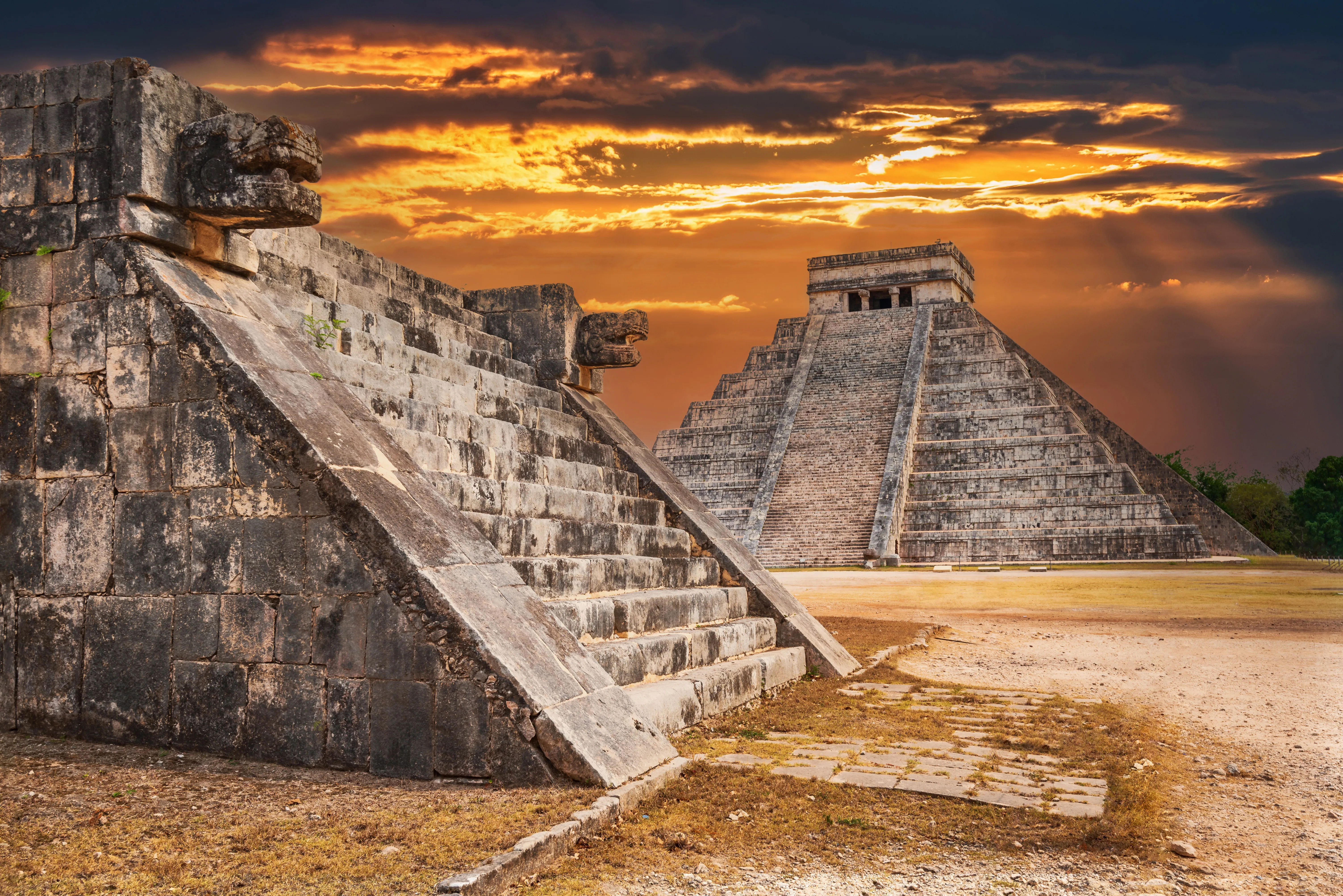 Serpent head staircase at sunset in Chichen Itza
