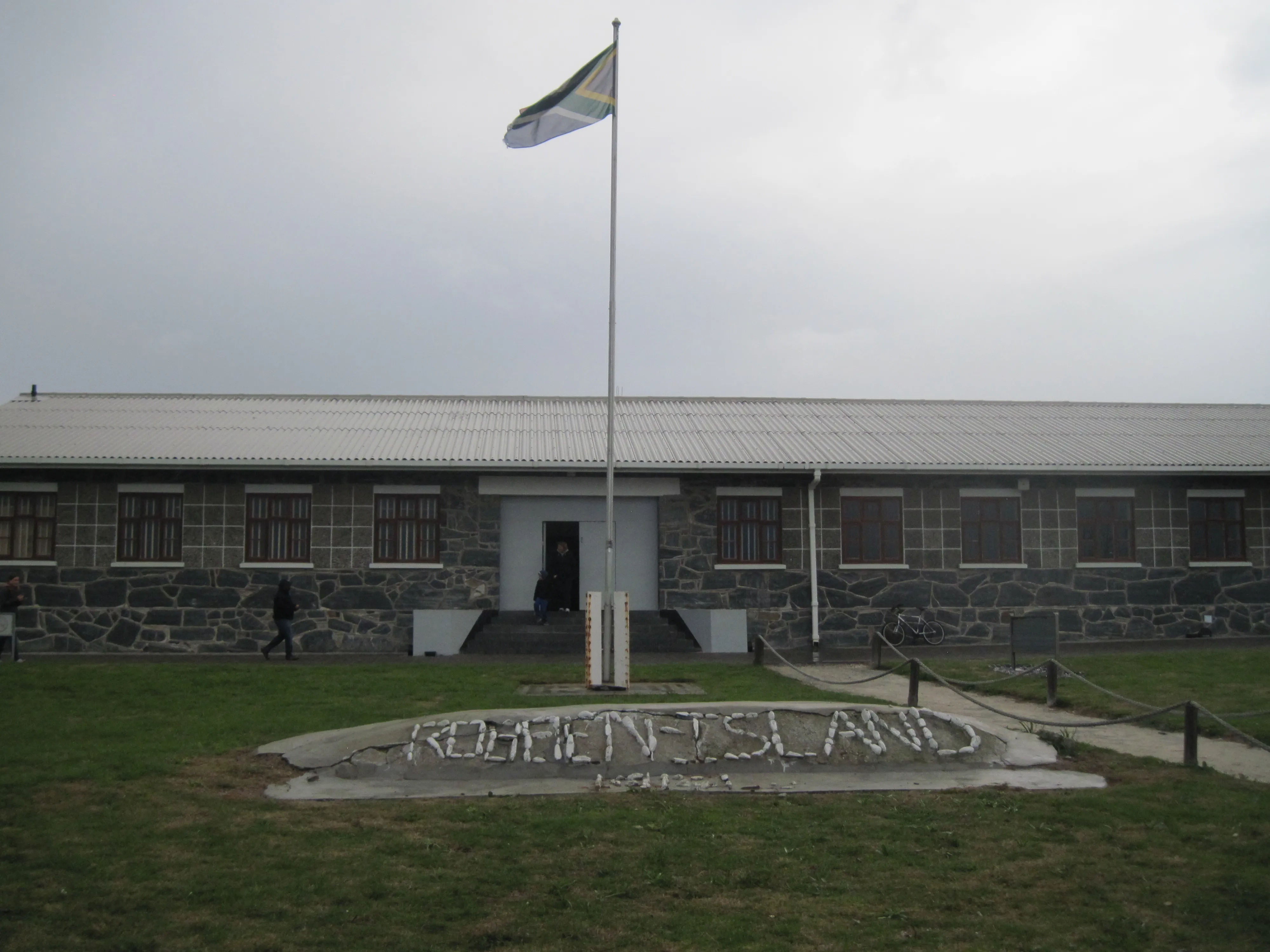 Entrance area on Robben Island with the South African flag