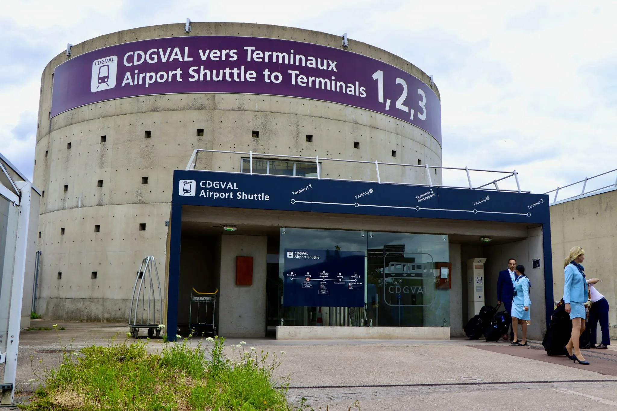 Night view of airport terminal shuttle pickup zone