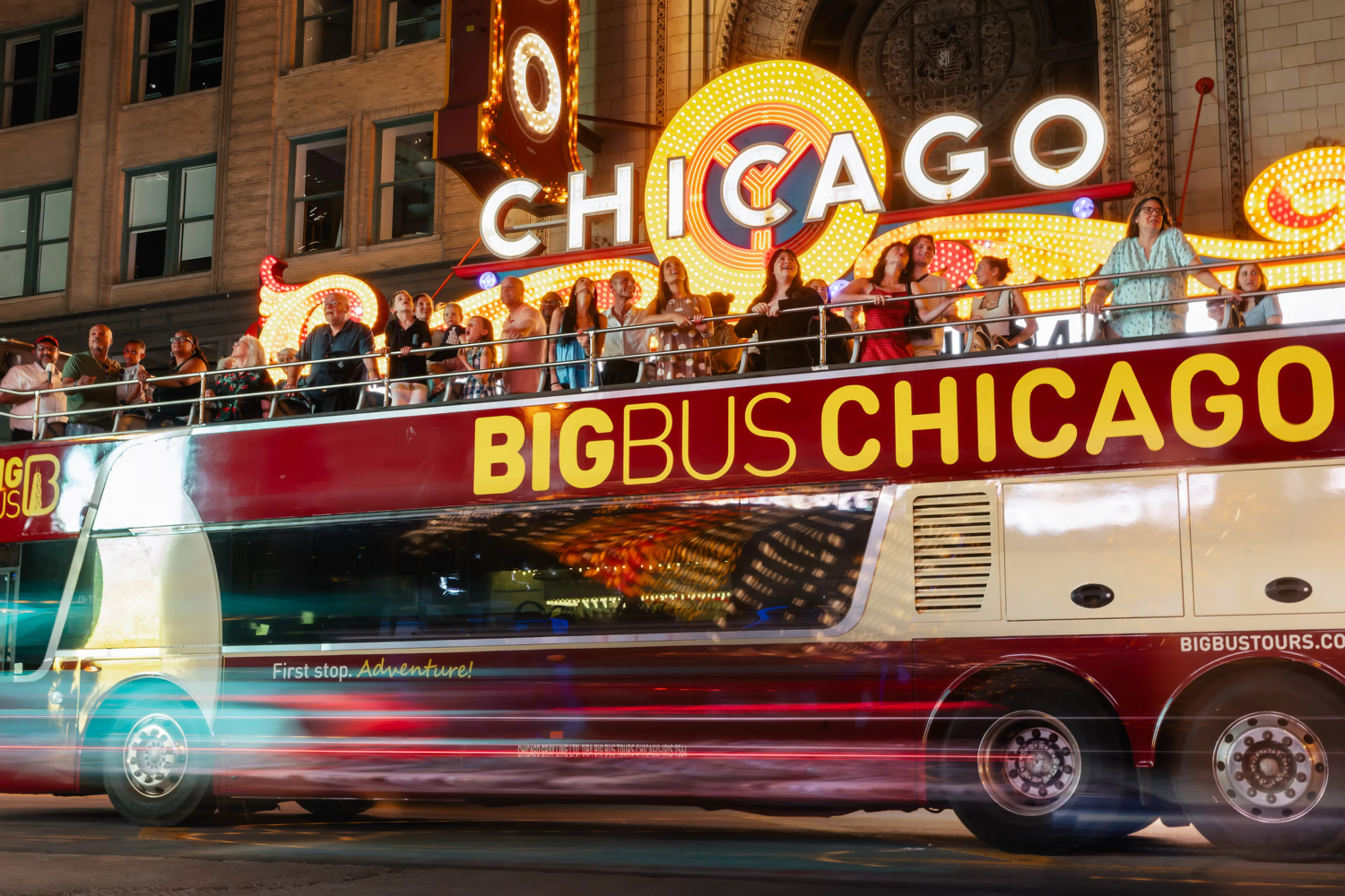 Tour bus passing by at night