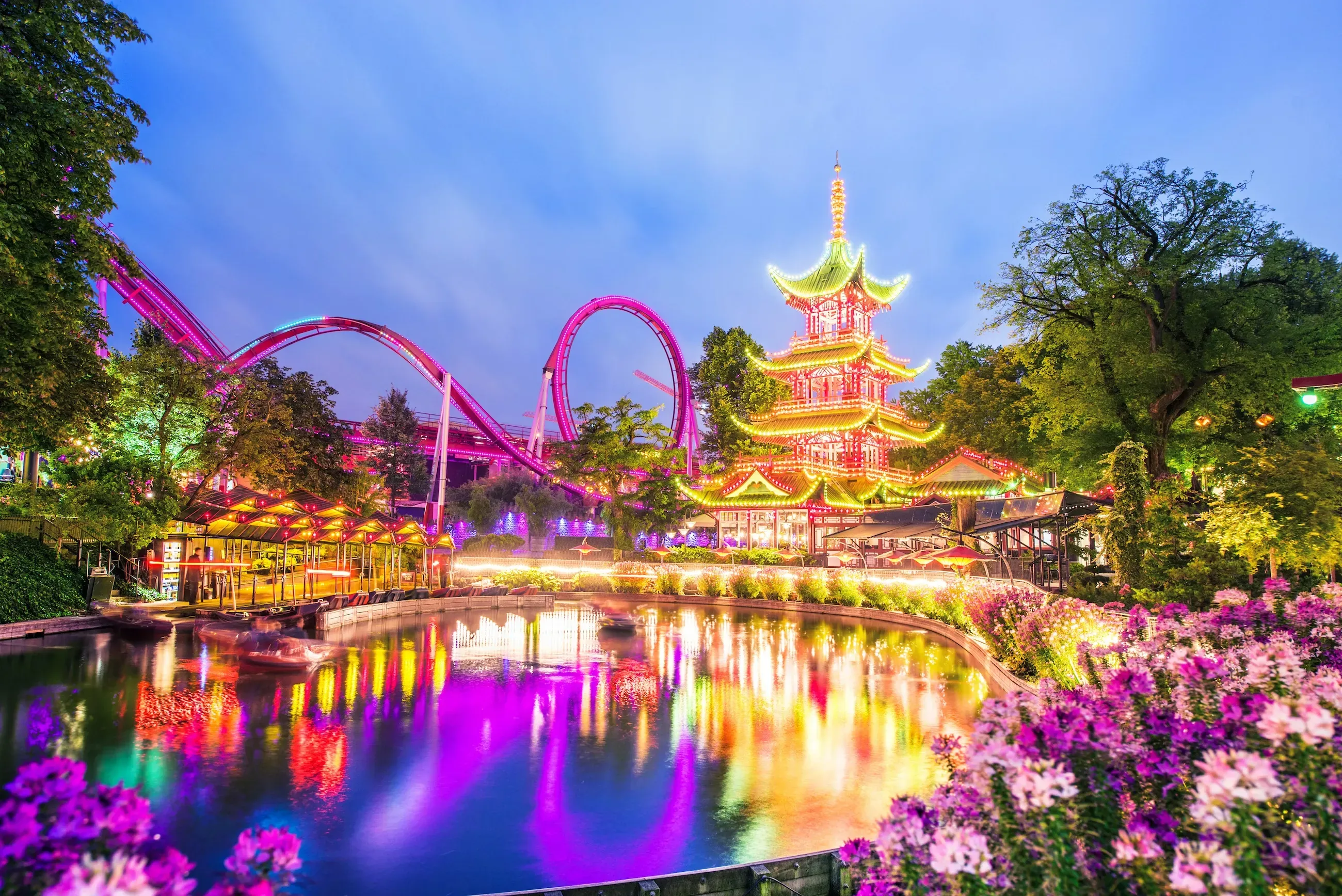 Tivoli Gardens illuminated at night with colorful lights