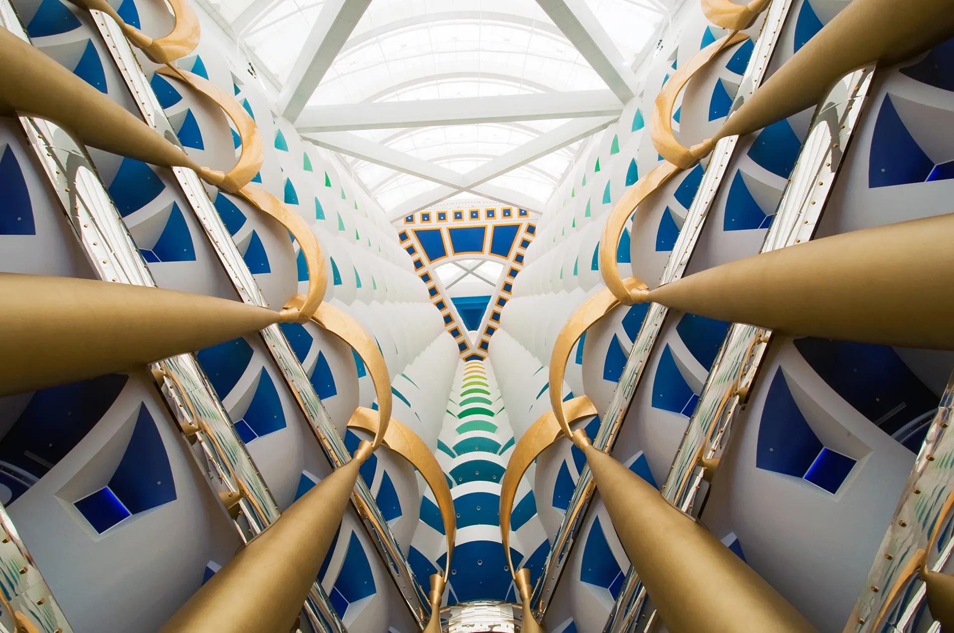 Vertical shot of the immense Burj Al Arab atrium