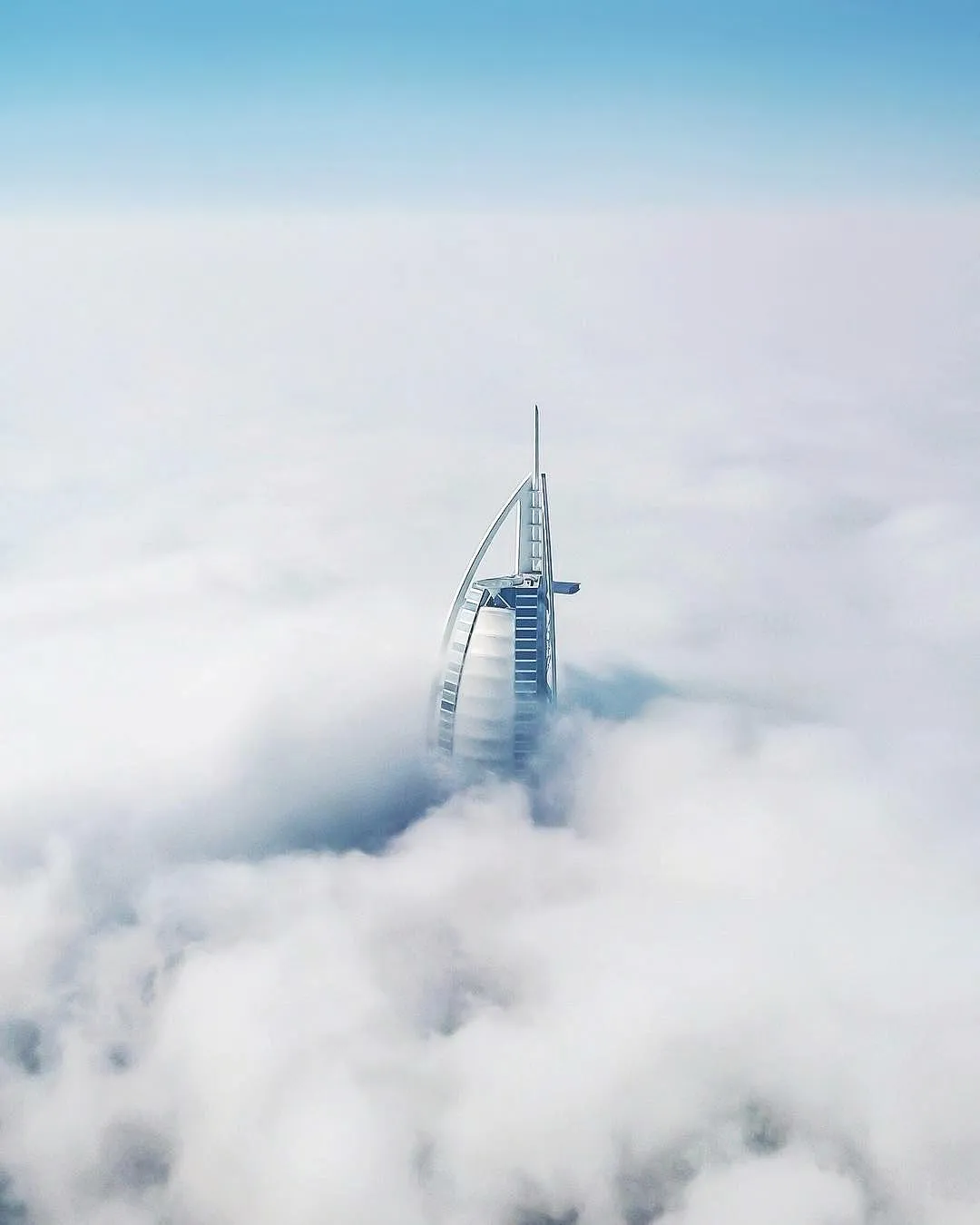 Burj Al Arab top emerging through low fog