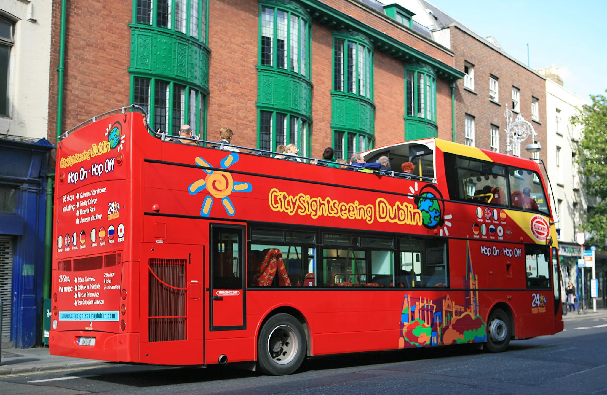 City sightseeing bus passing by bridge