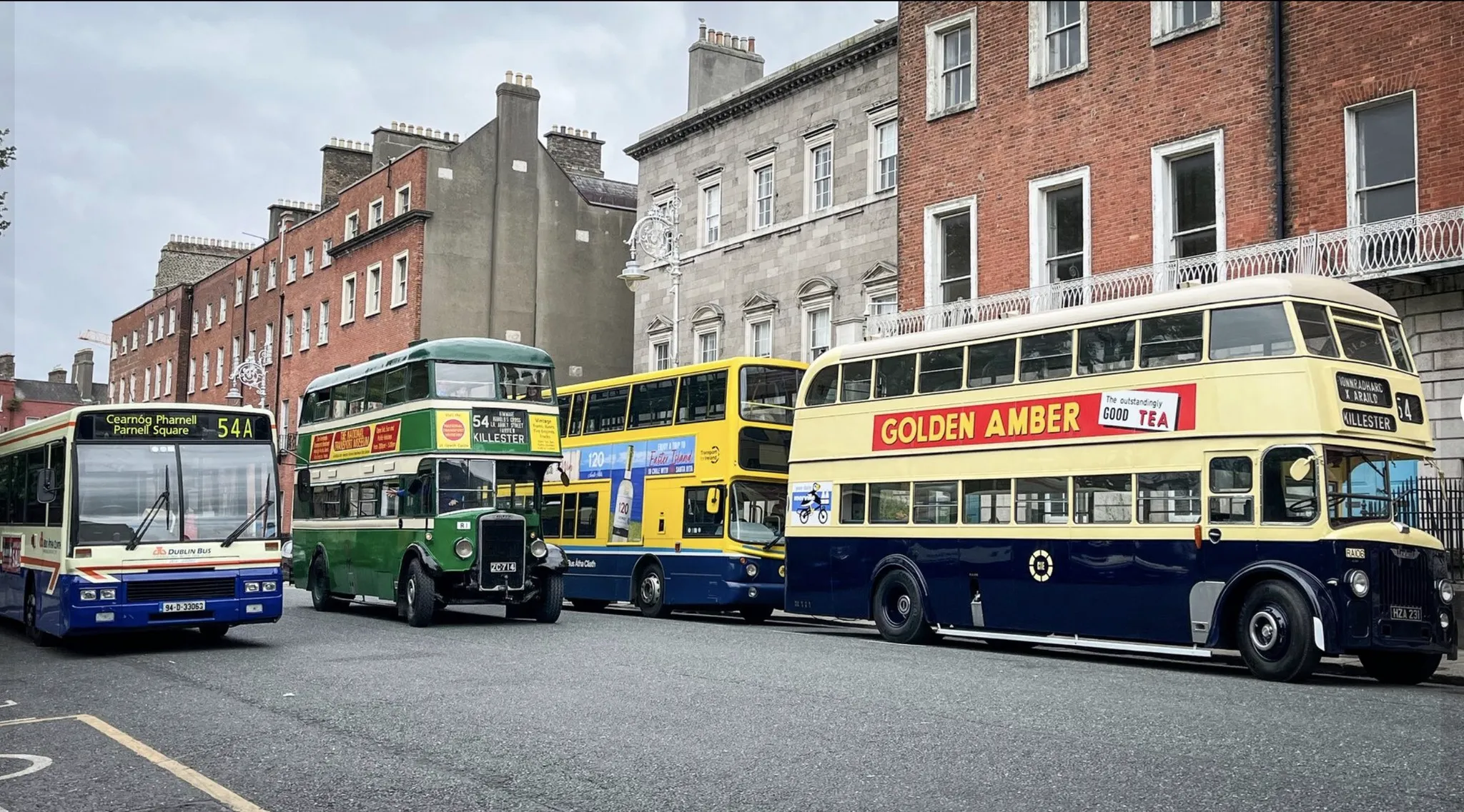 Parade of vintage buses