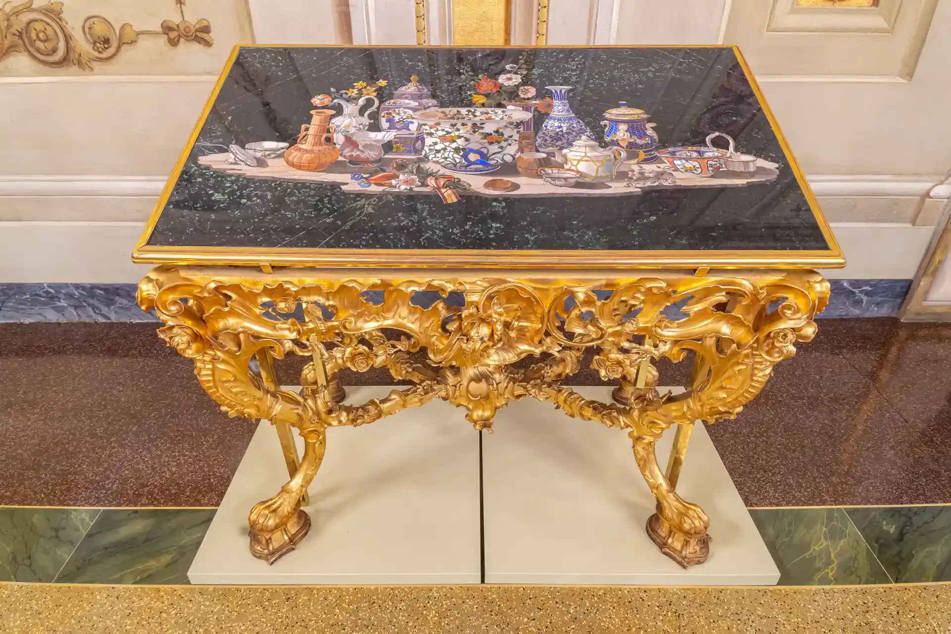 Decorative mosaic table with golden fruit motif