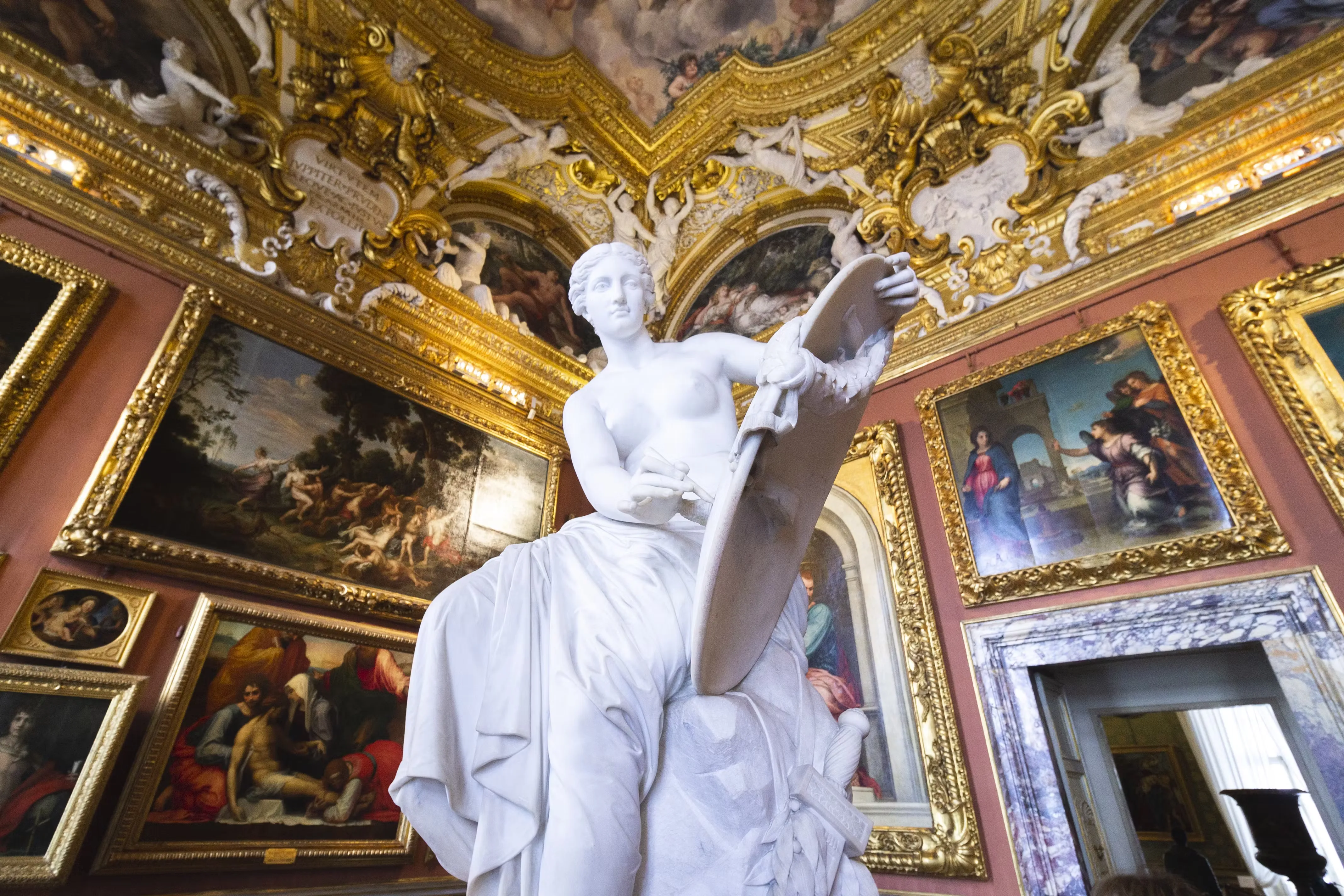 Paintings arranged salon style in Palatine Gallery