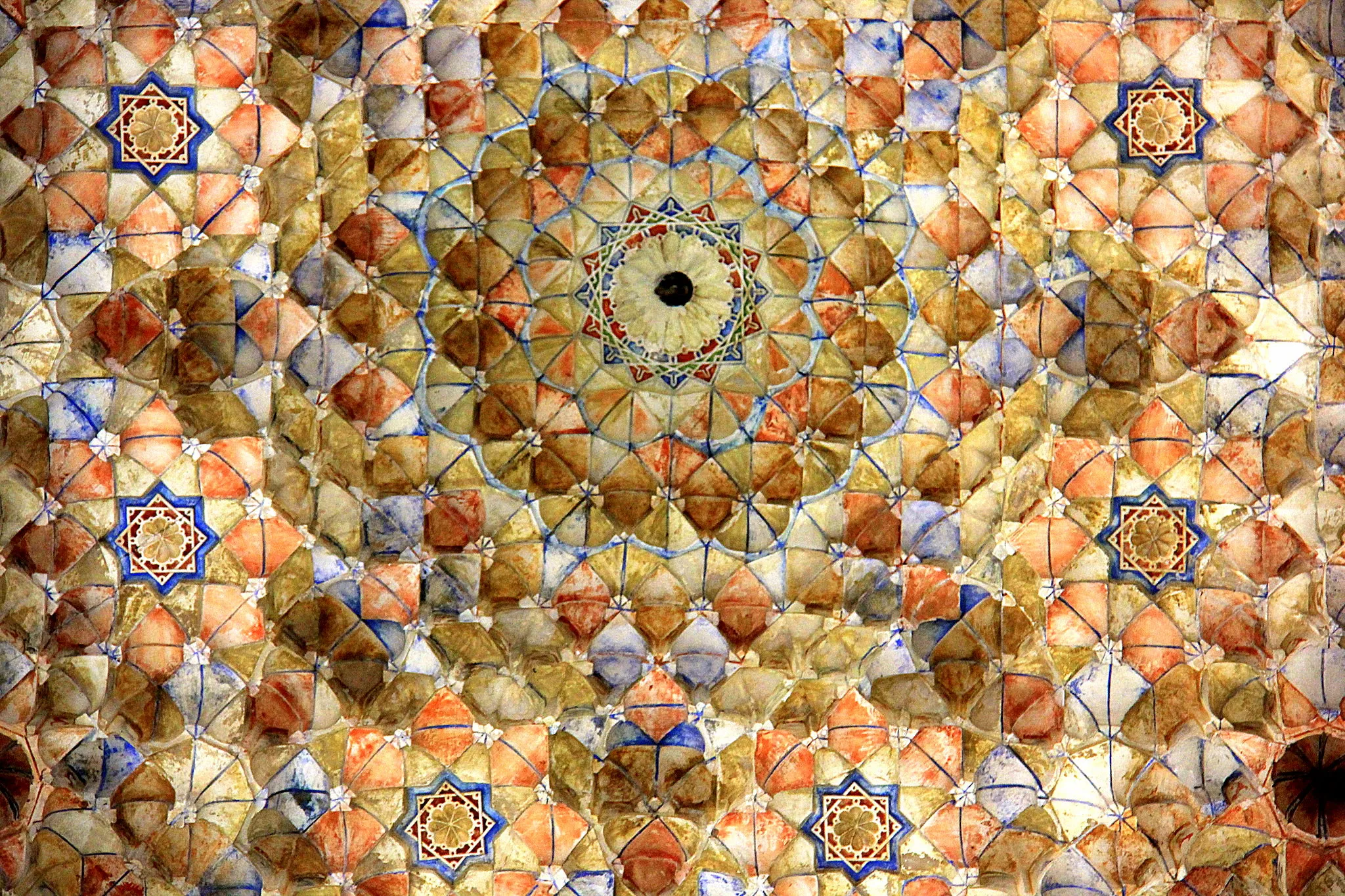 Intricate mosaic ceiling in the Alhambra