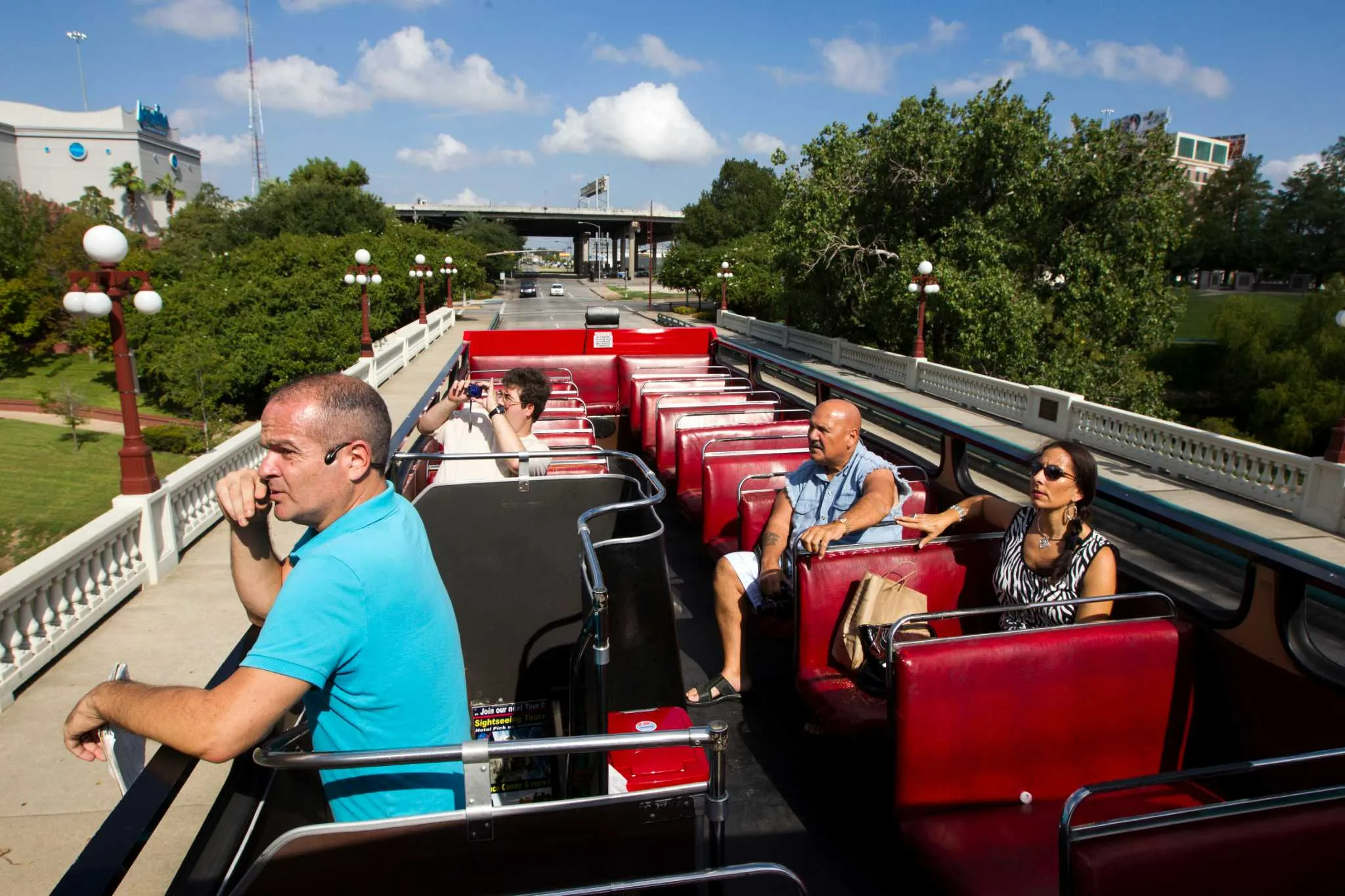 Tourists seated on the open-top bus in Houston
