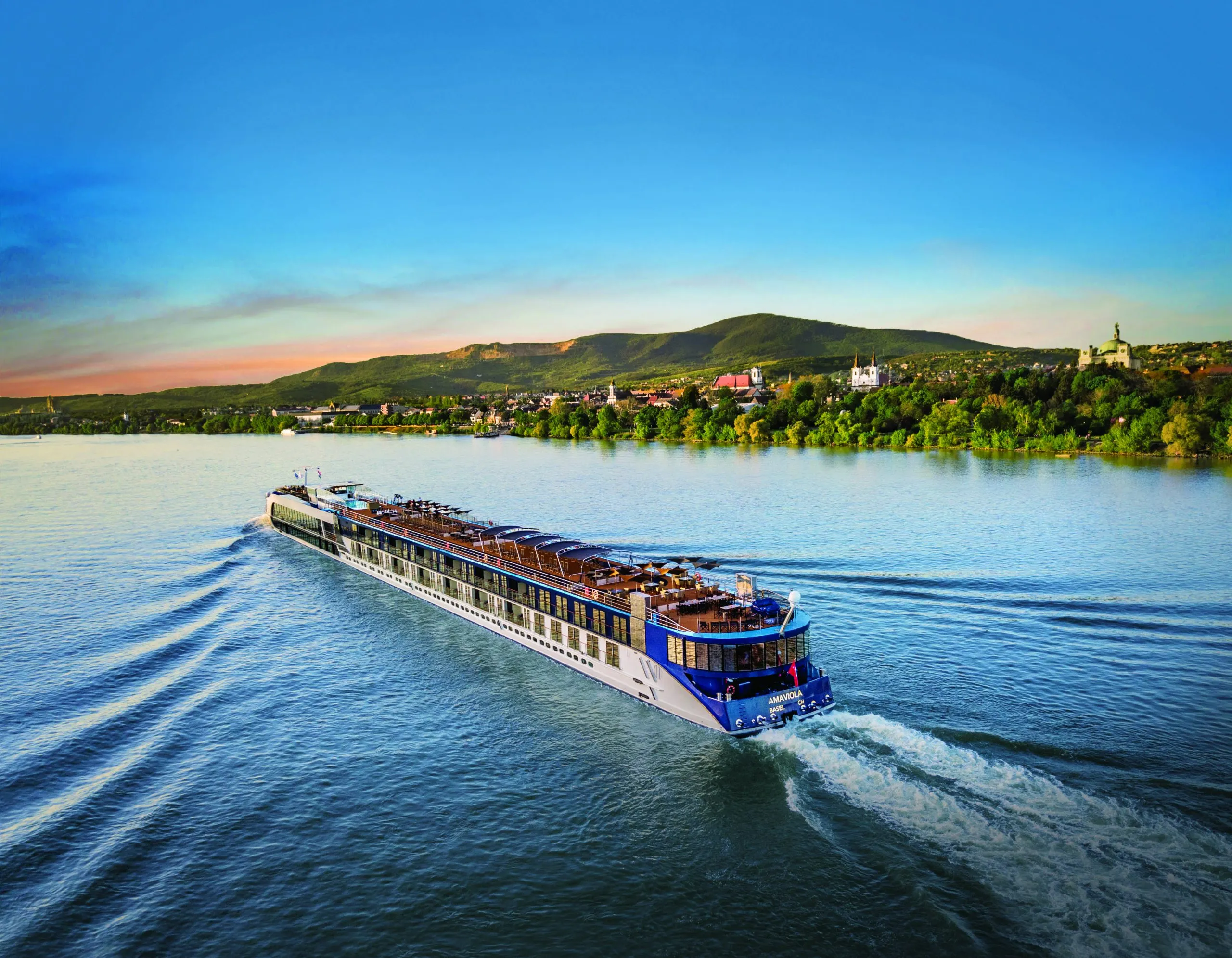 River cruise through green Danube valley landscapes
