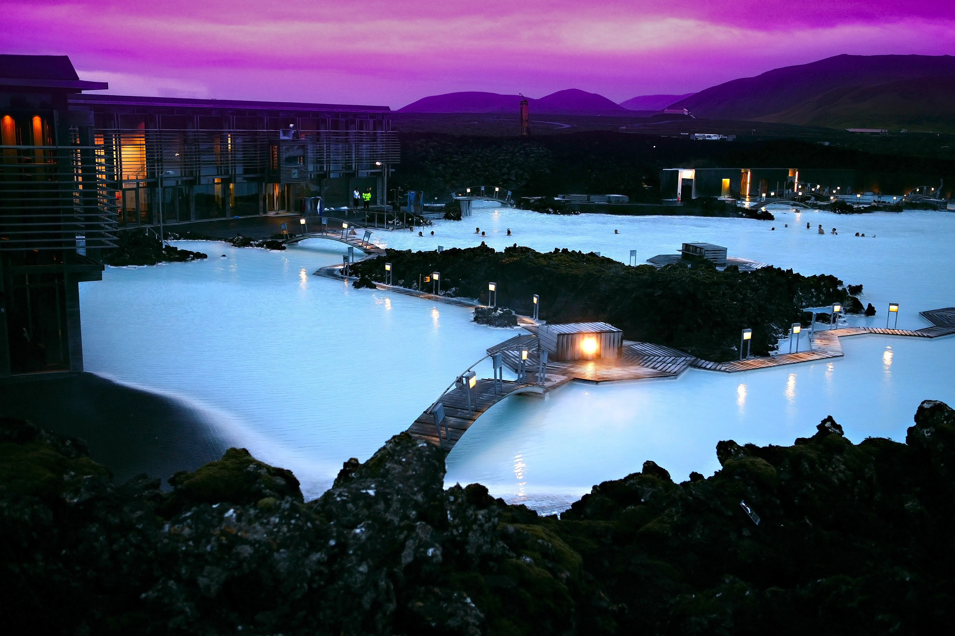 Blue Lagoon pool with pink sky reflections