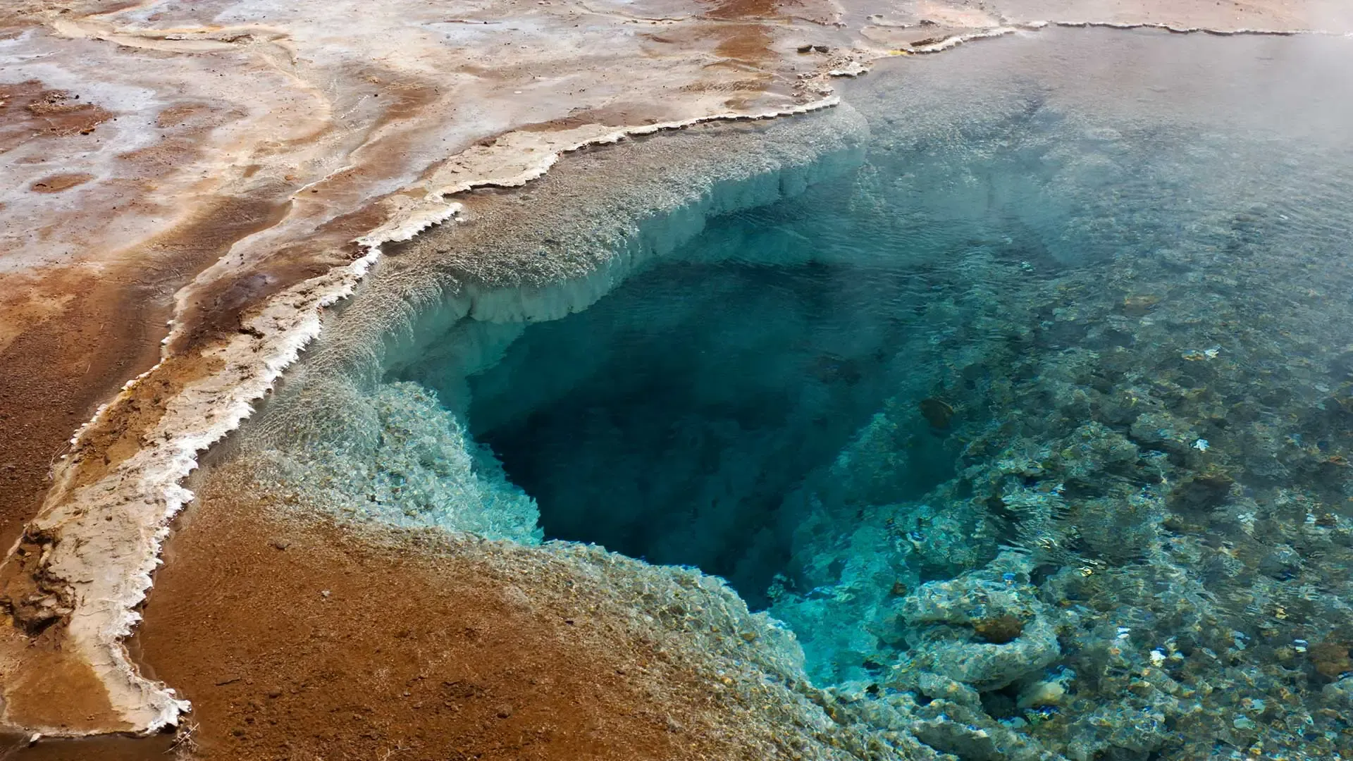 Geyser with crystal-clear water in Iceland