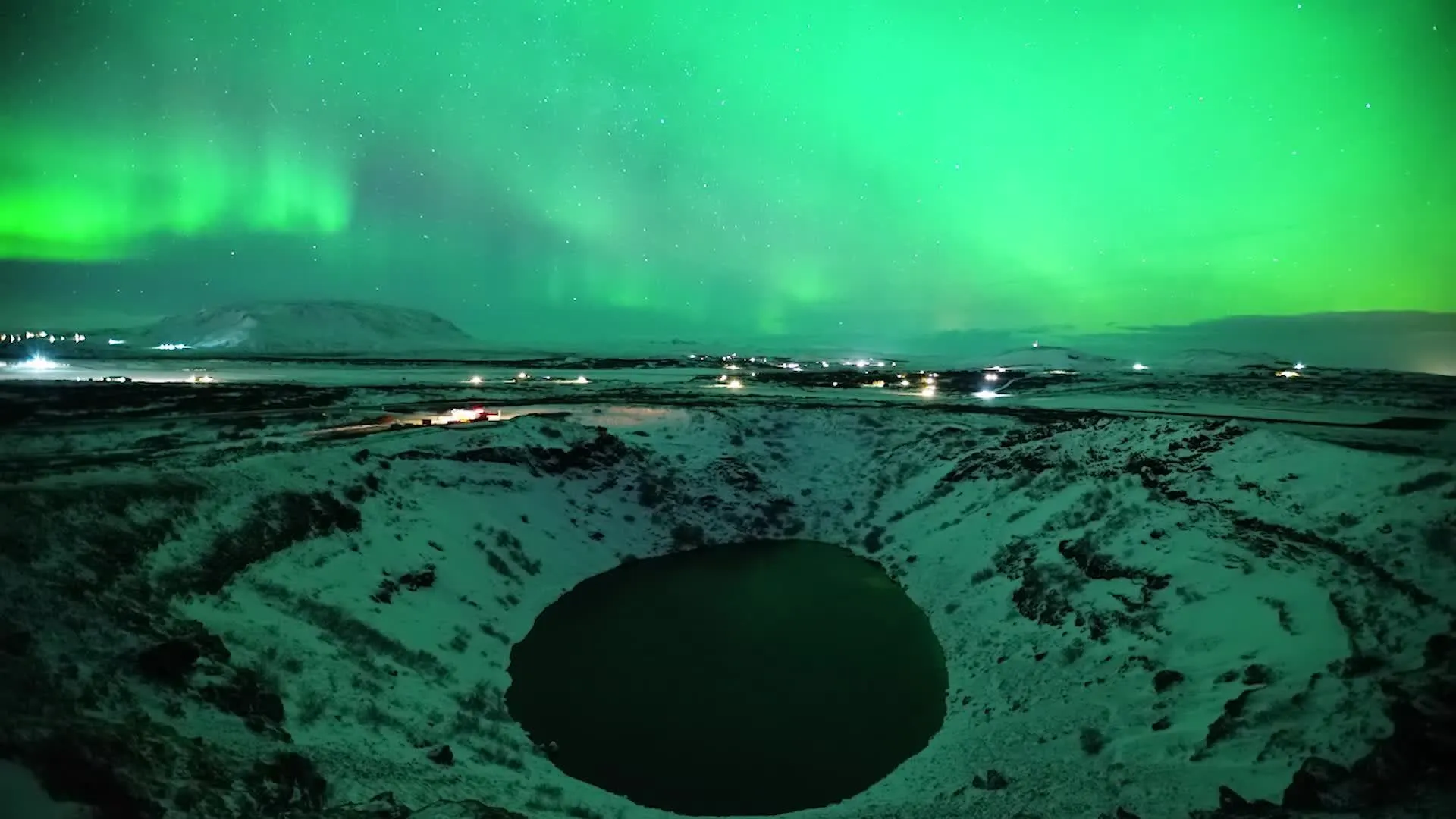 Northern lights over Icelandic landscape
