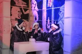 Guests cheering with drinks inside the bar