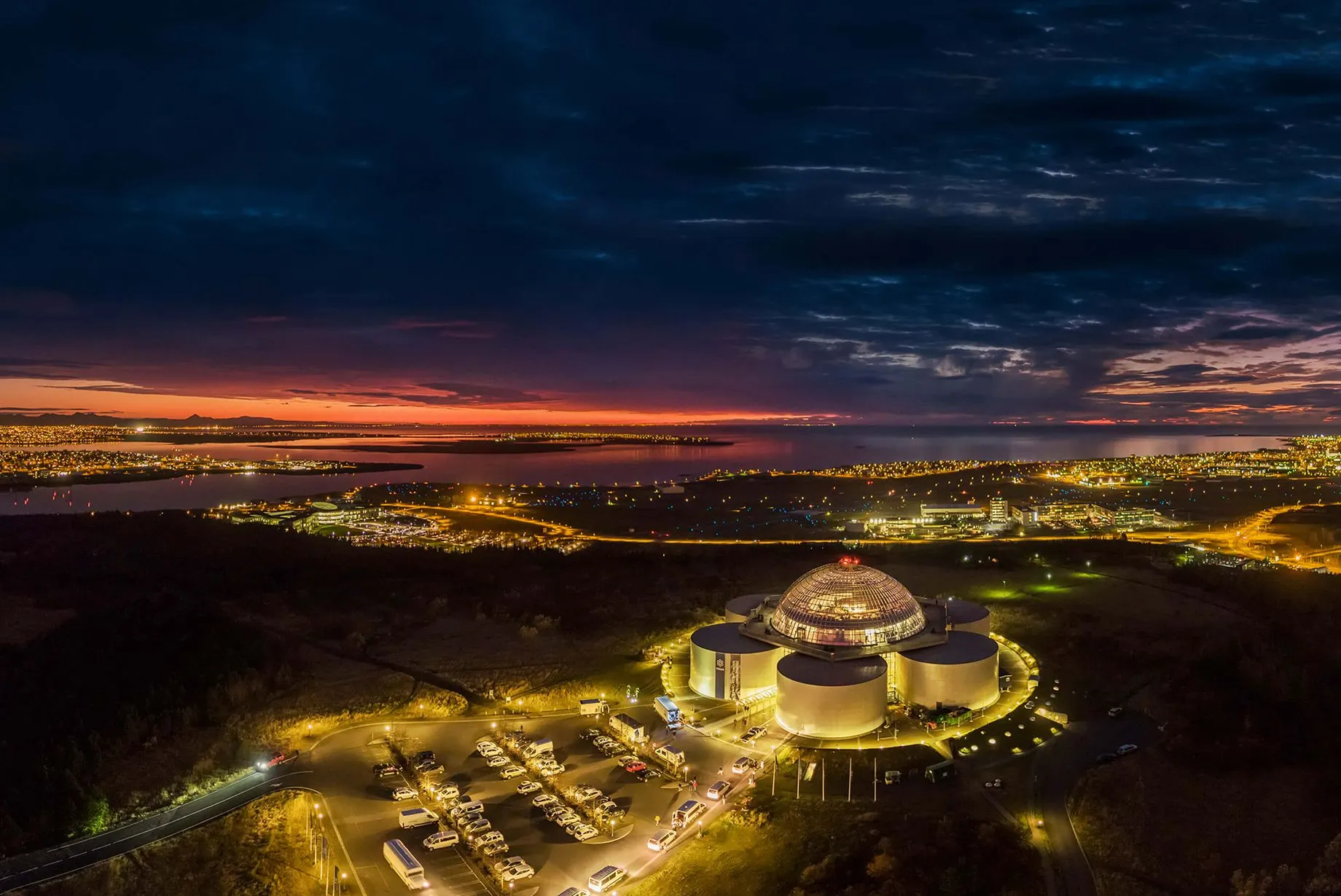 Perlan illuminated over Reykjavík at night