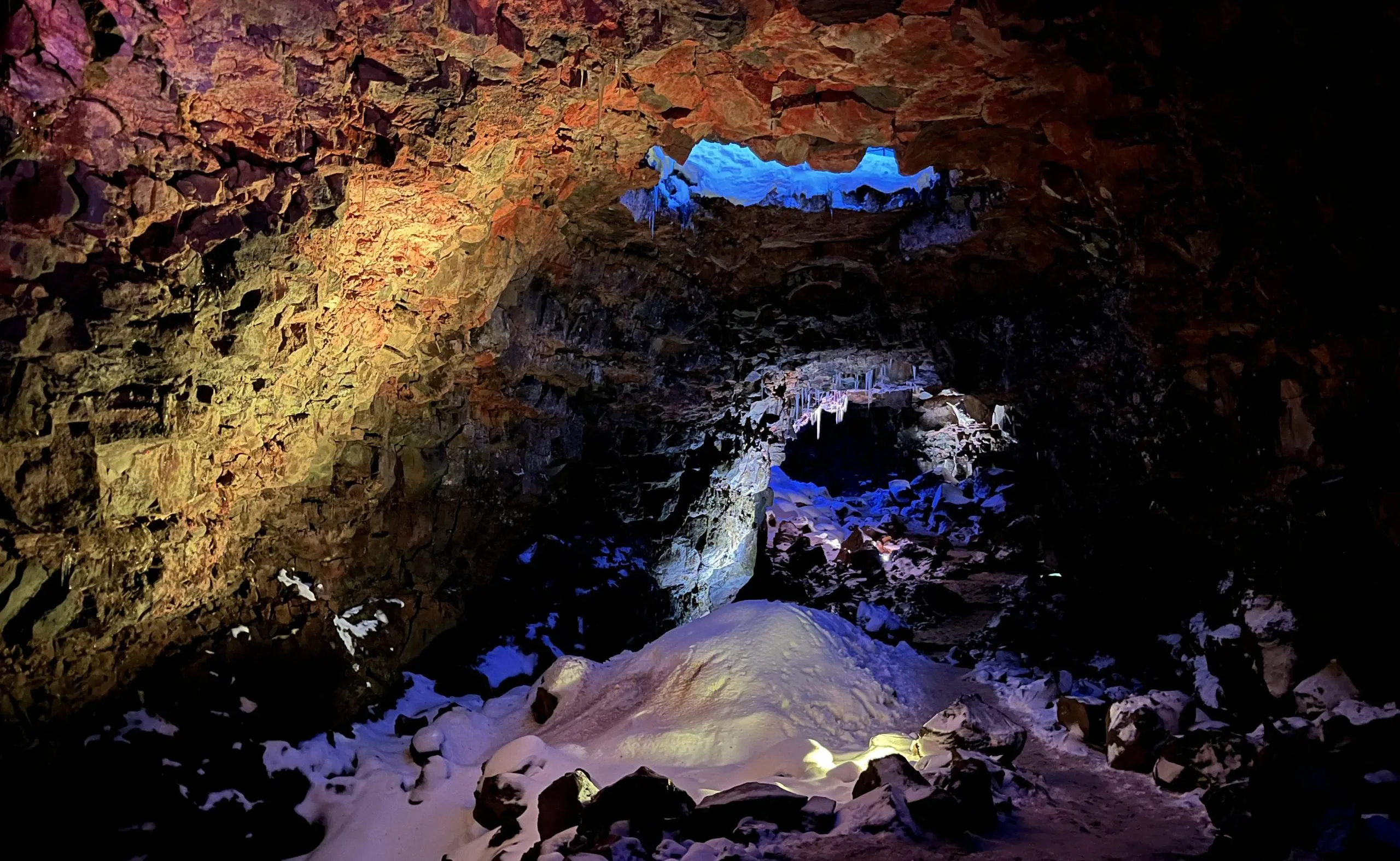 Iceland lava tunnel at night