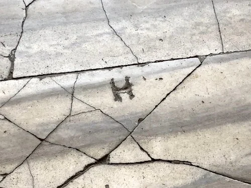 Marble engraving detail on floor/walls