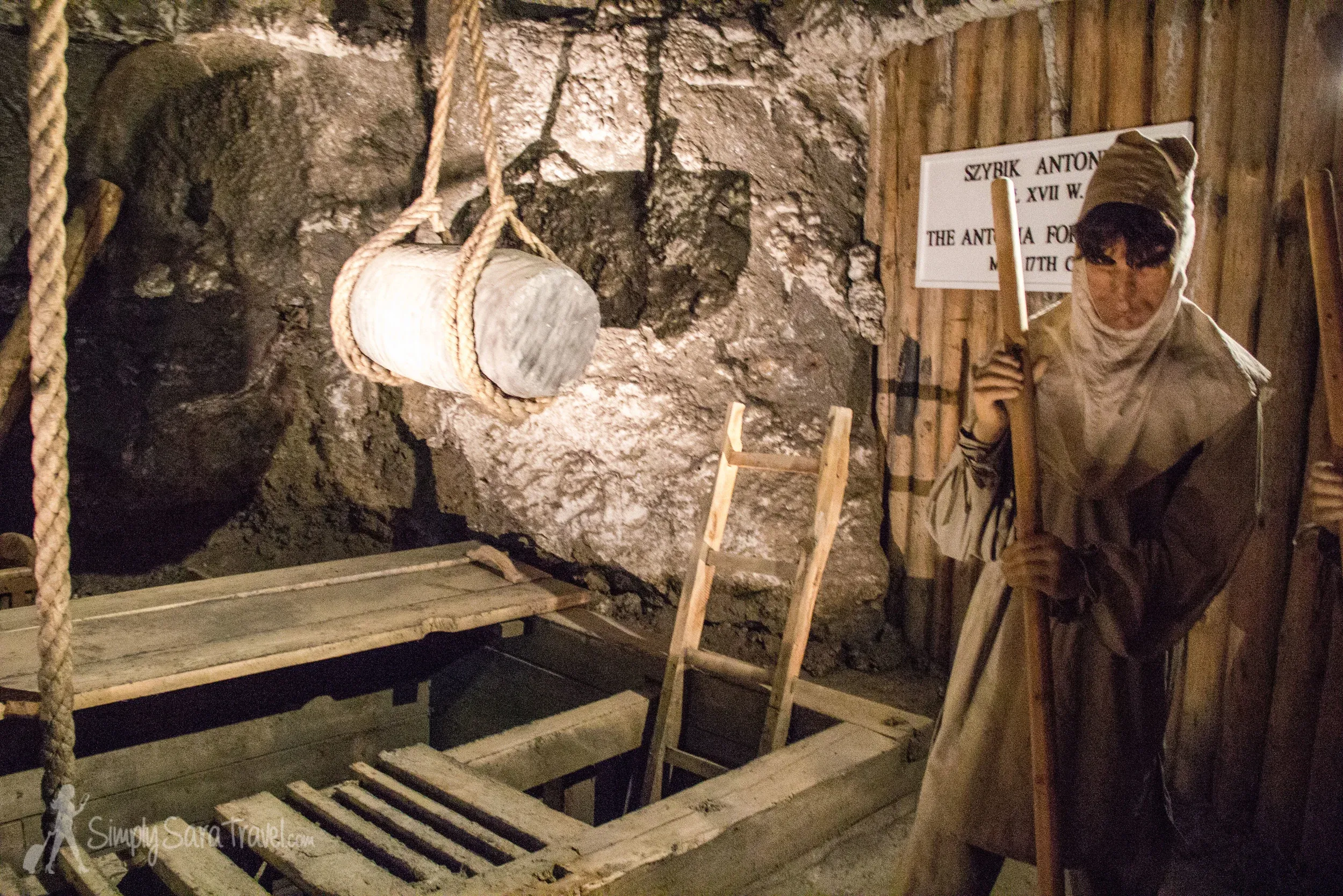 Historic salt mining tools and worker demonstration scene