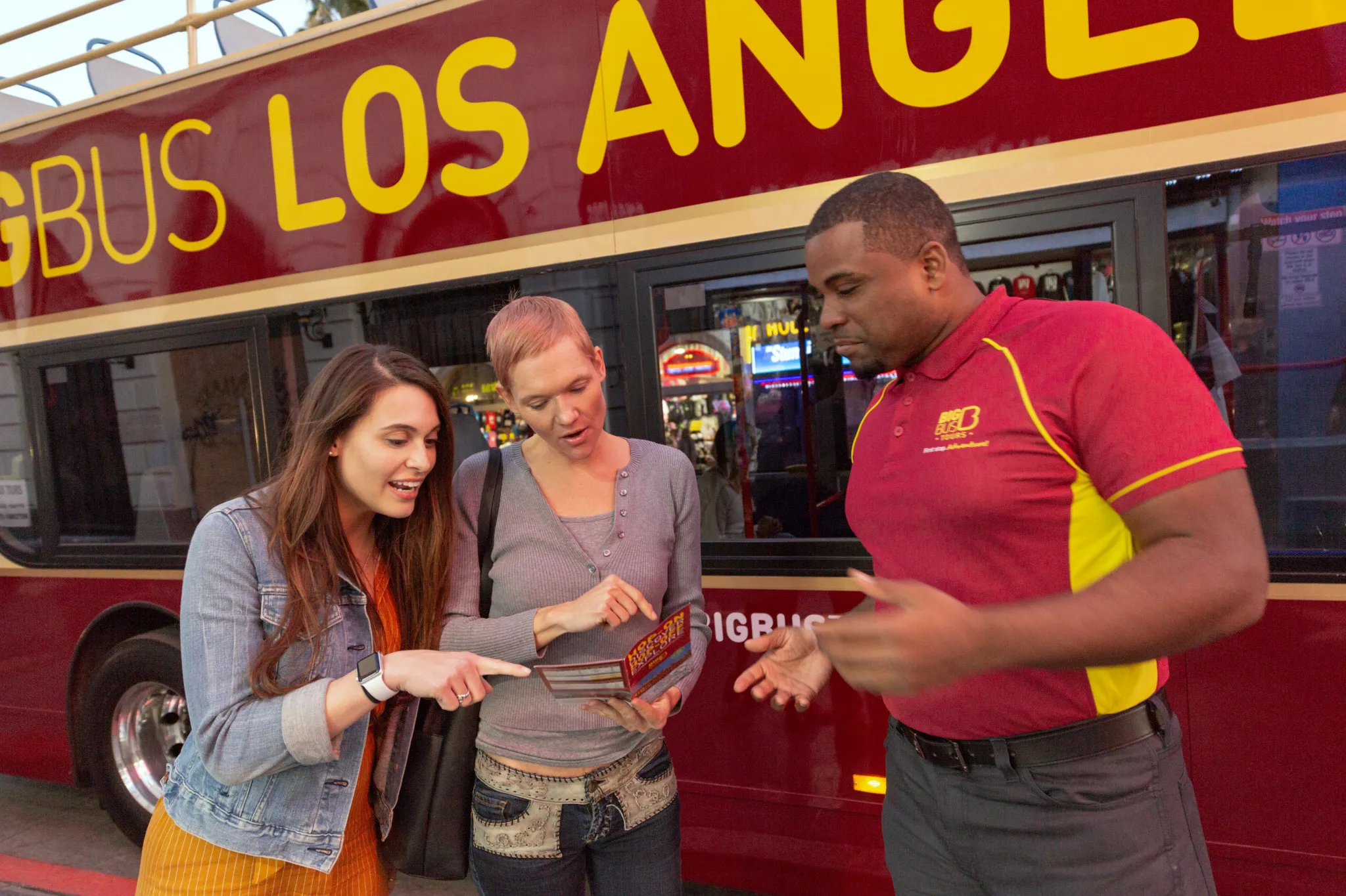 Tourists asking the bus driver for directions