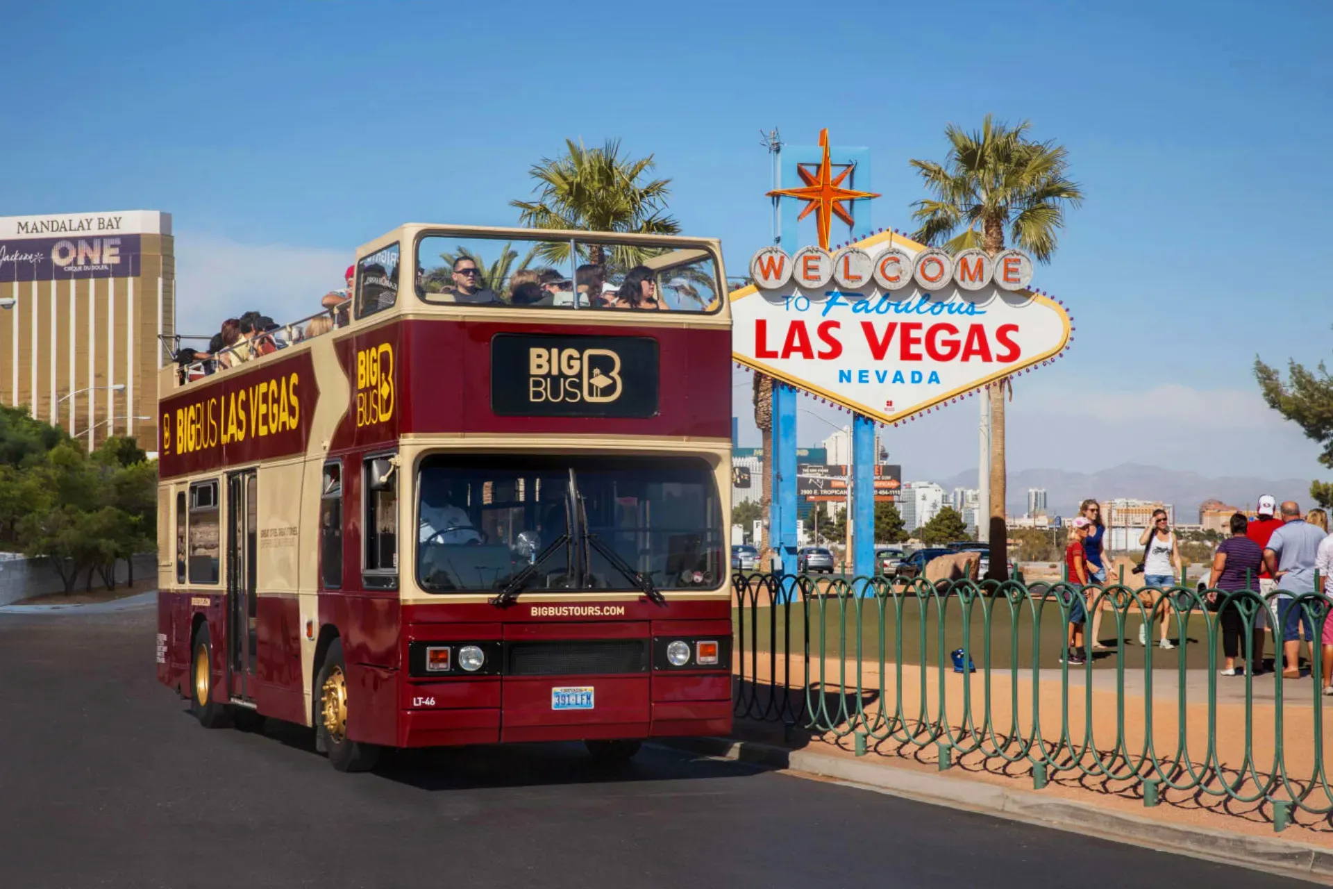 Big Bus near Welcome to Las Vegas sign
