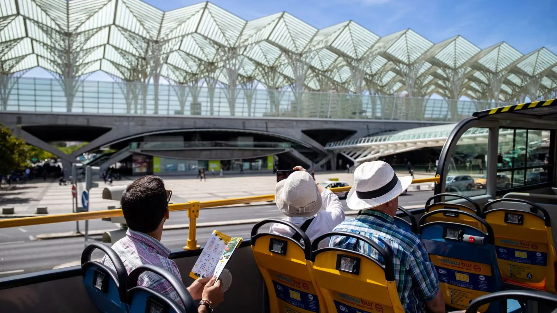 Panoramic city view from bus roof