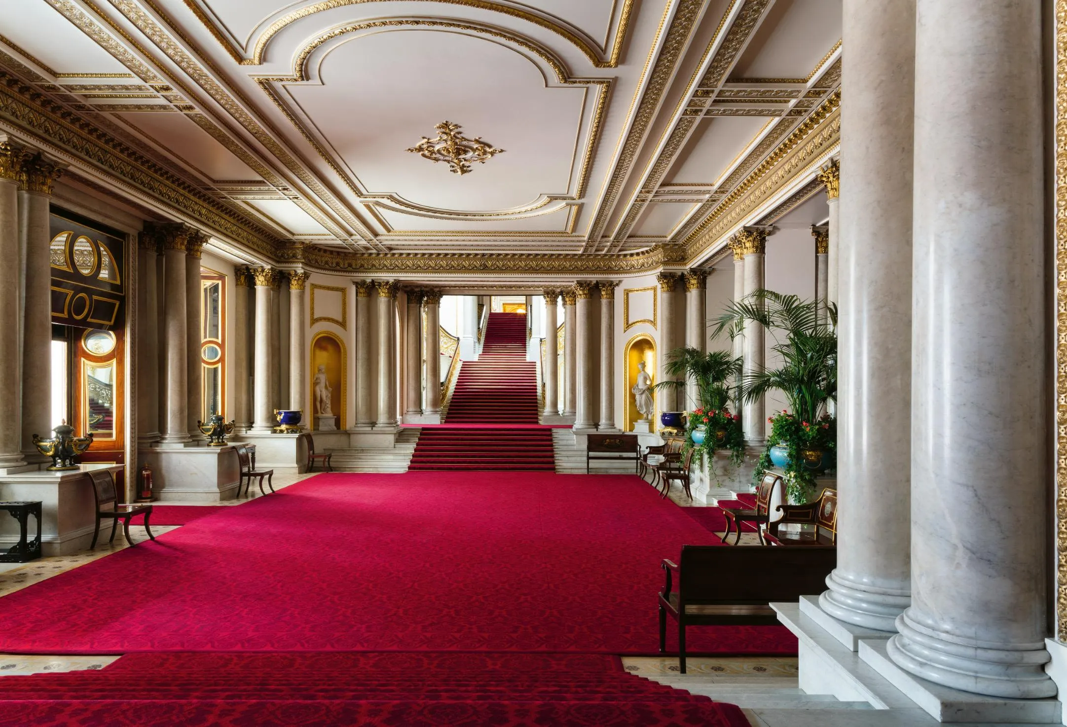Opulent State Room interior with chandeliers and gilded moldings