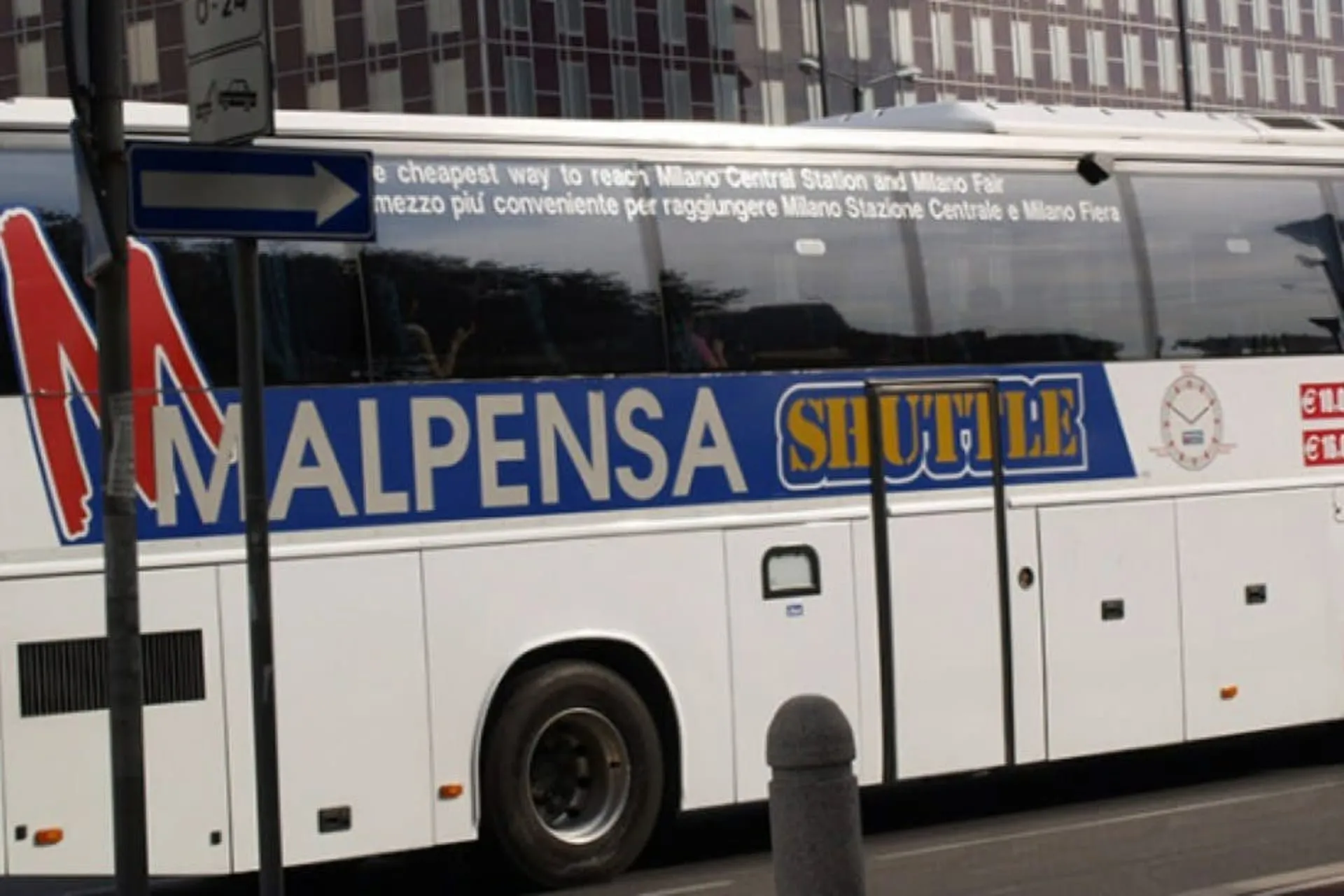 Malpensa airport shuttle bus parked at terminal