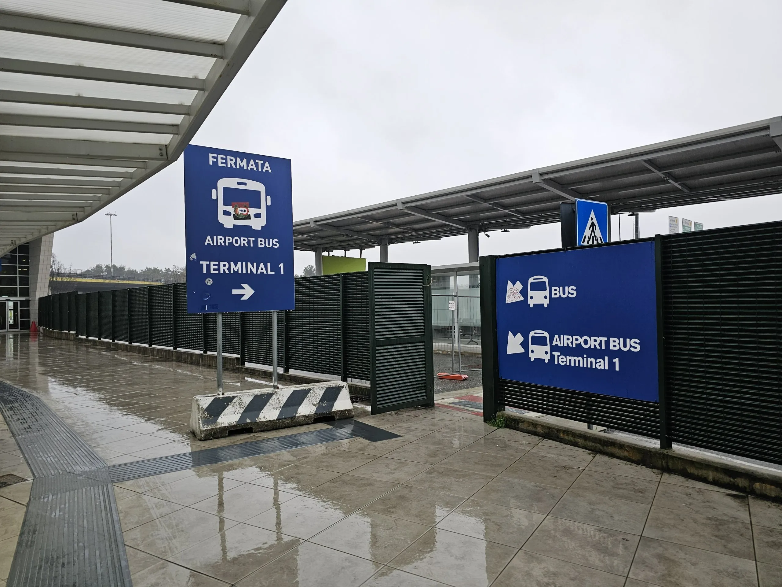 Malpensa terminal exterior with bus pickup lanes