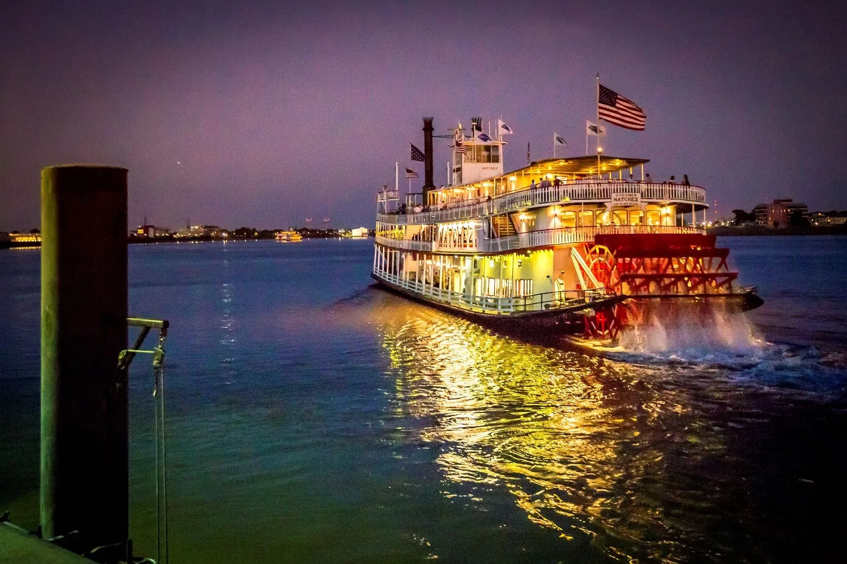 Night cruise boat sailing the Mississippi River
