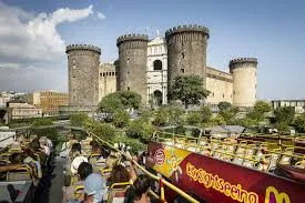Tourists on City Sightseeing Bus Roof