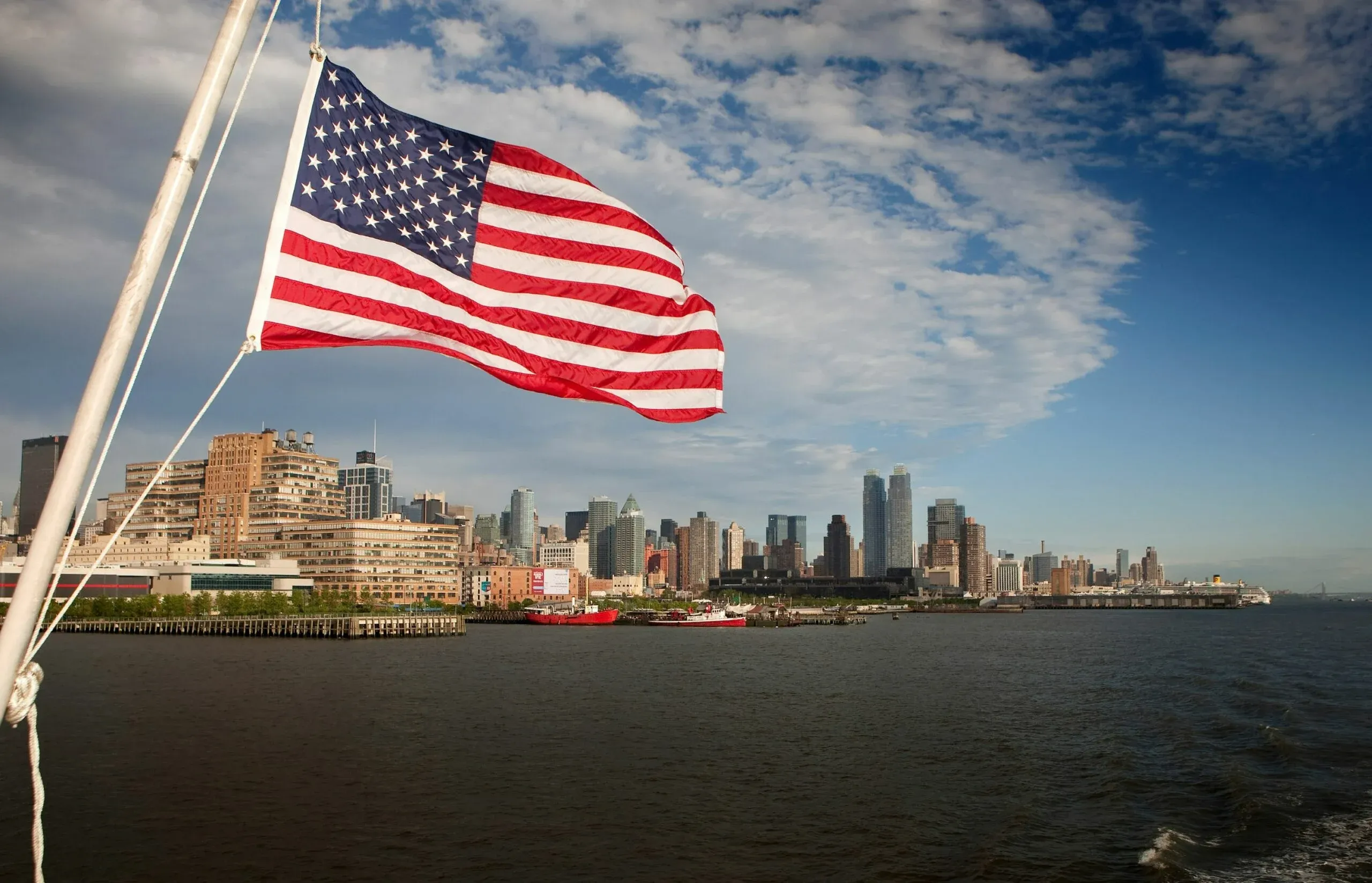 American flag waving on a New York cruise boat