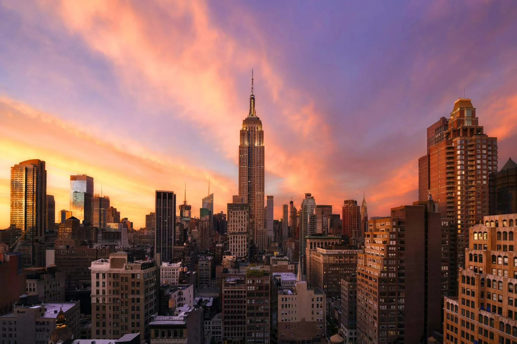 Empire State Building wide view at sunset