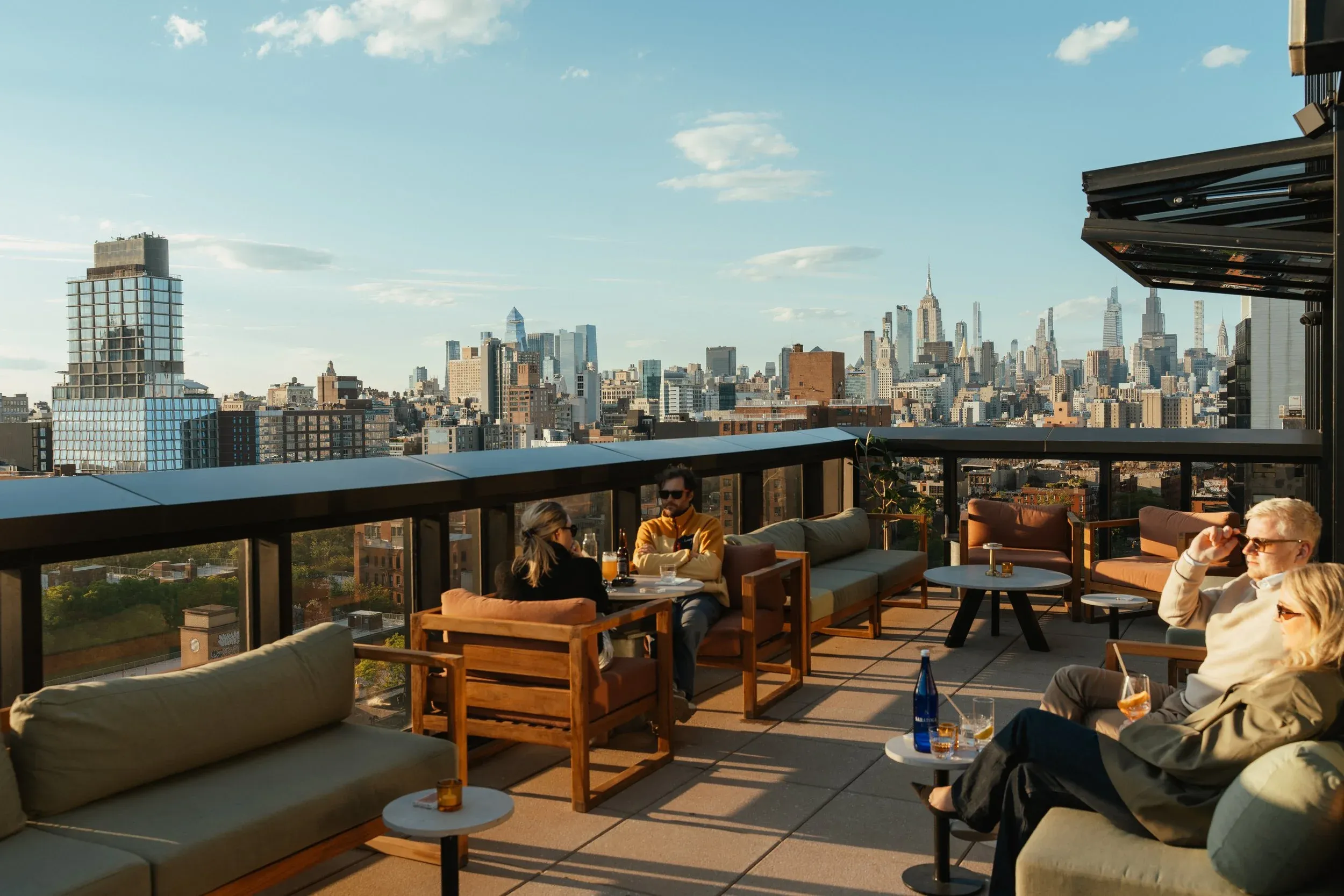Rooftop bar atmosphere in Lower East Side at dusk