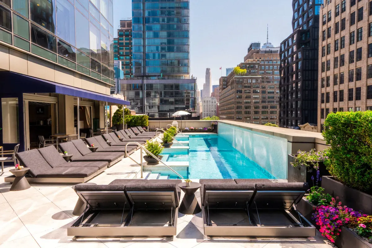 NYC rooftop terrace oasis at sunset