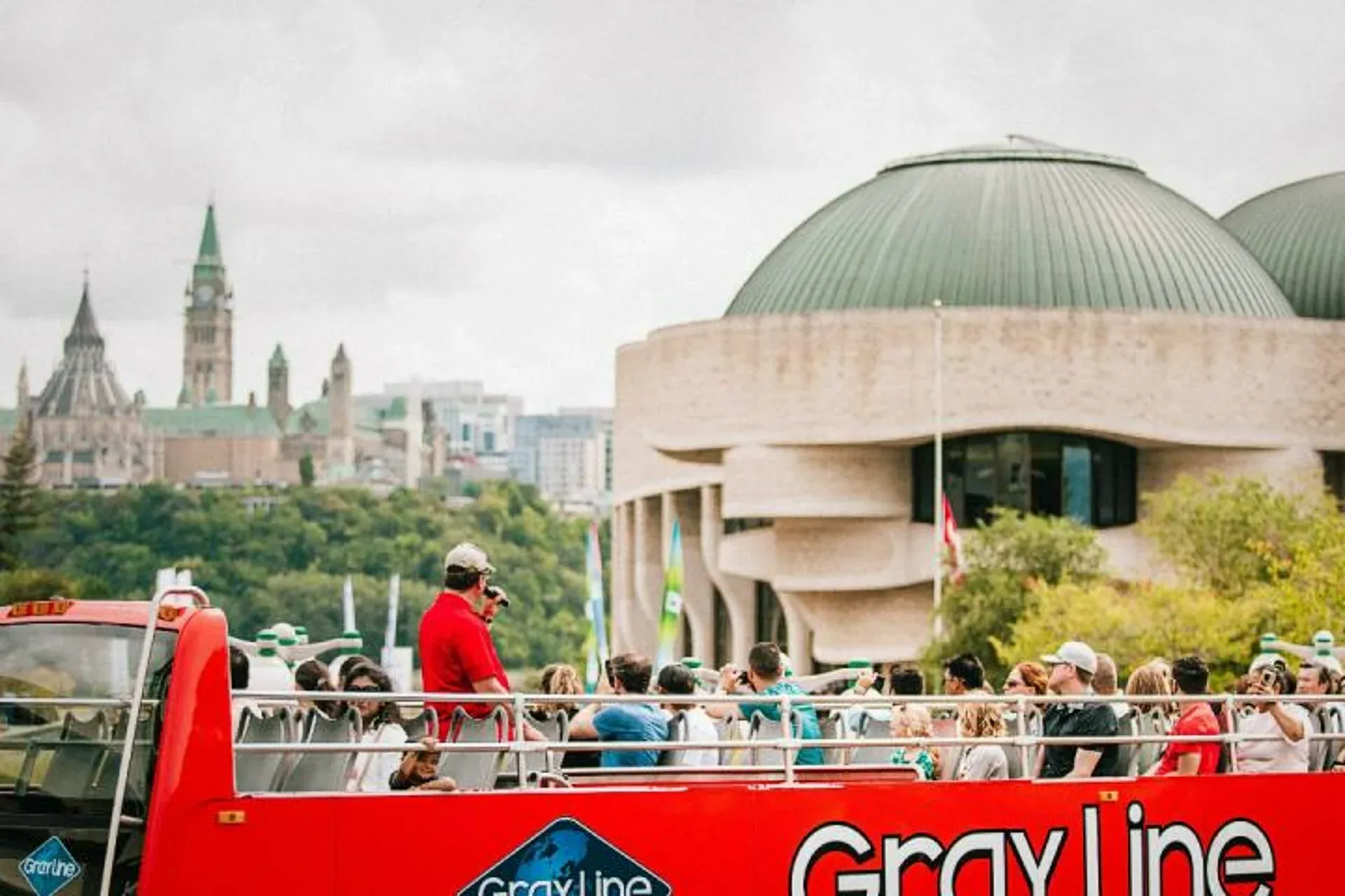 Sightseeing bus roof-deck view of Ottawa landmarks