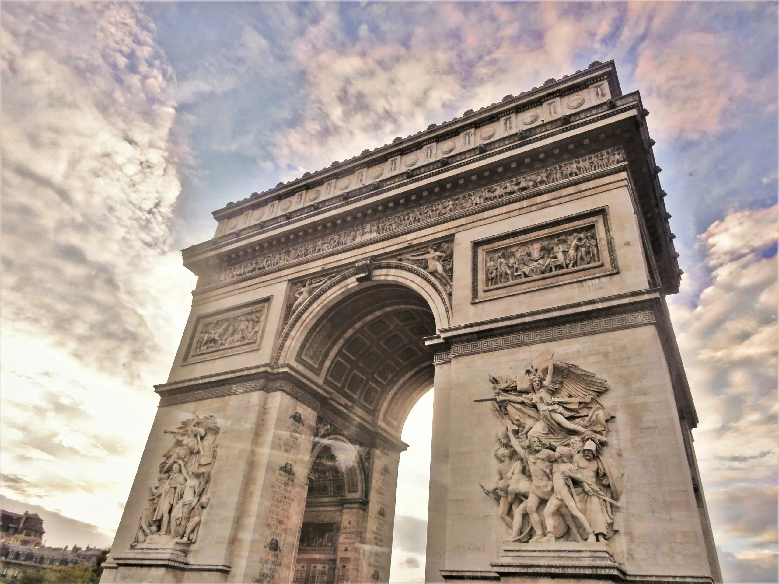 Arc de Triomphe from below with sky backdrop