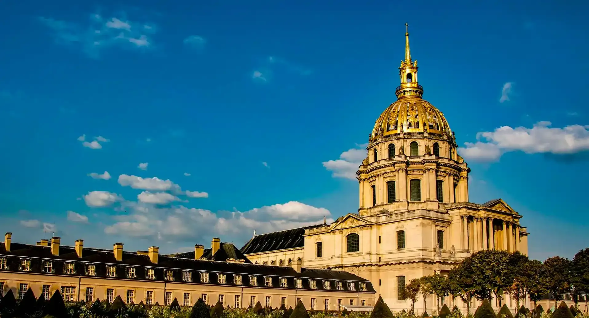 The golden dome of Les Invalides shining in the sunlight