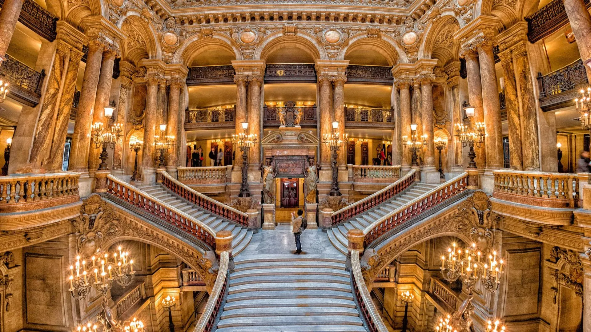 Palais Garnier grand staircase in marble with statues